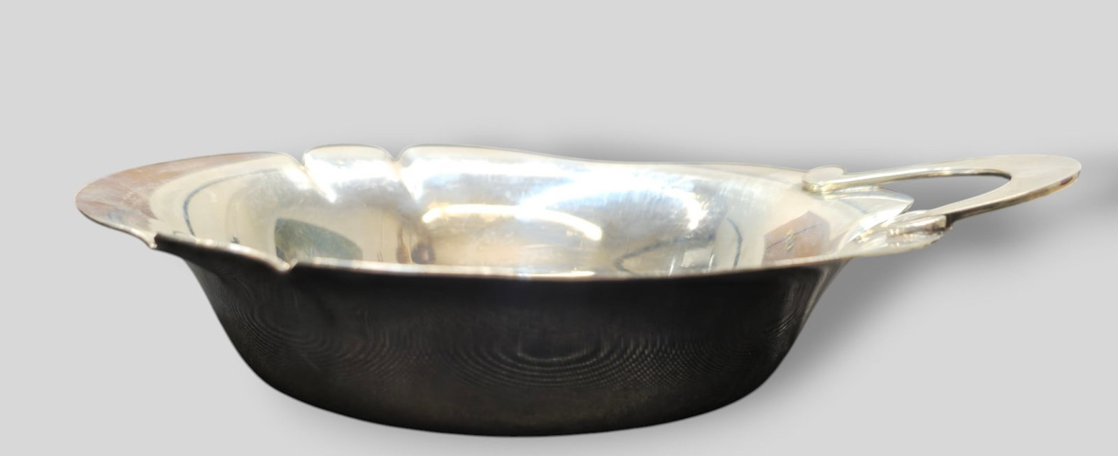 Richard Dimes Sterling Silver Candy Bowl 661: Richard Dimes Sterling Silver Candy Bowl 661. Scalloped border and loop handle. Manufacturer's mark to underside, sterling and #661. 7w x 6d x 1 1/2h. Weight 6.035