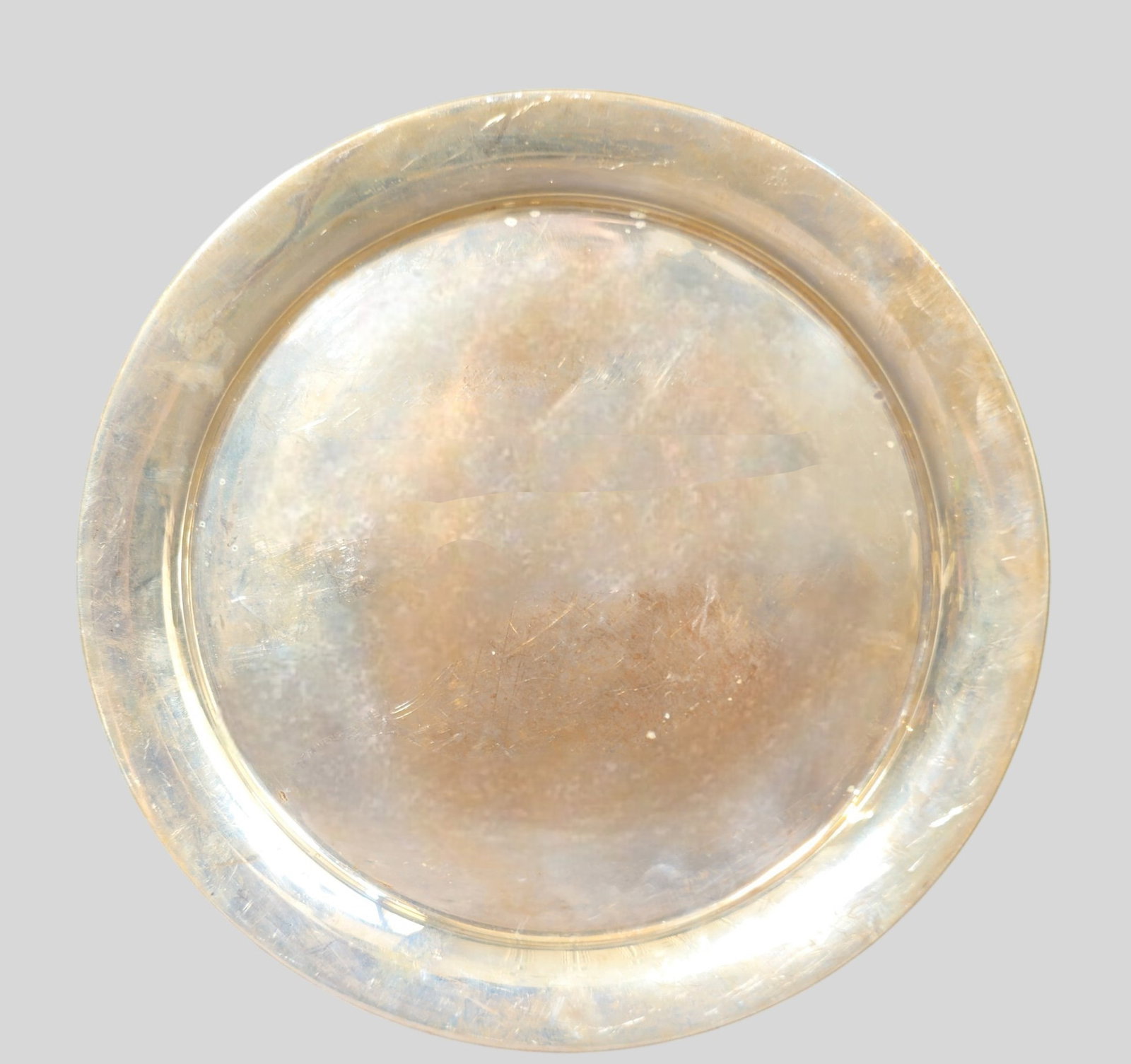 Watson Co. Sterling Silver Round Tray K10: Watson Co. Sterling Silver Round Tray K10. Manufacturer's mark to underside and sterling silver. 10 1/ 16 dia x 5/8h. Weight 13.050