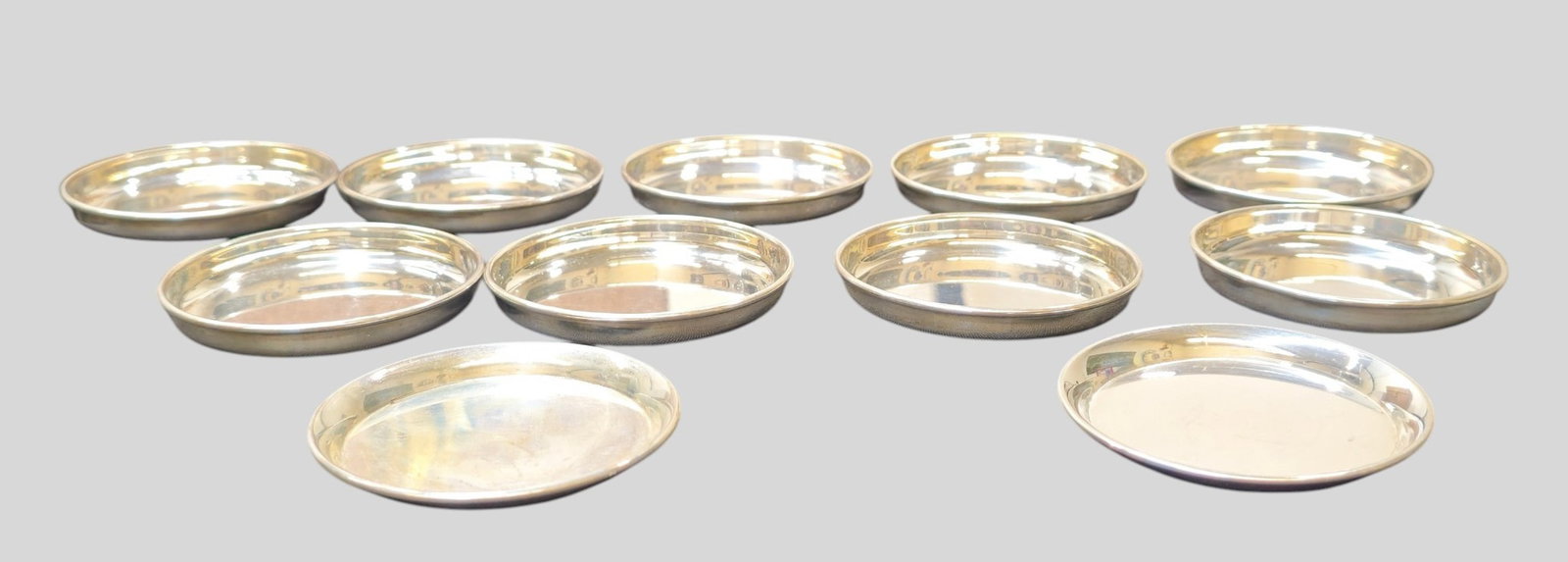 Birks Sterling Silver Mint Dishes: Birks Sterling Silver Mint Dishes. Set of 9 plus two odd. Manufacturer's mark to side. 3 1/16 dia x 3/8h. Weight 9.40 ozt.