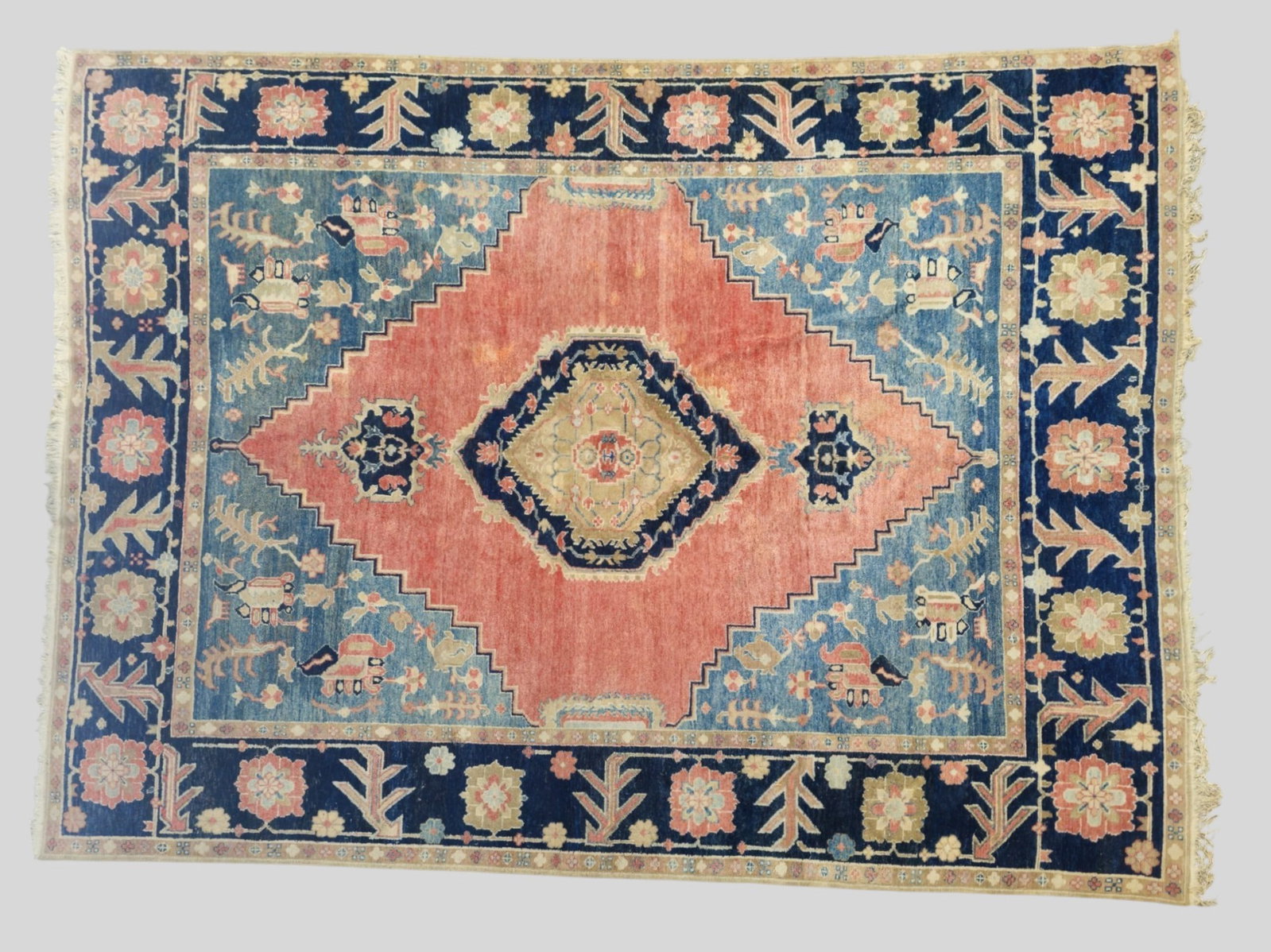 Anatolian Area Rug: Anatolian Area Rug. 1970s. All over garden design over an open rose field and center medallion. Pastel in colors. Multiple layer borders. 9ft 1/4in x 11ft 11in.