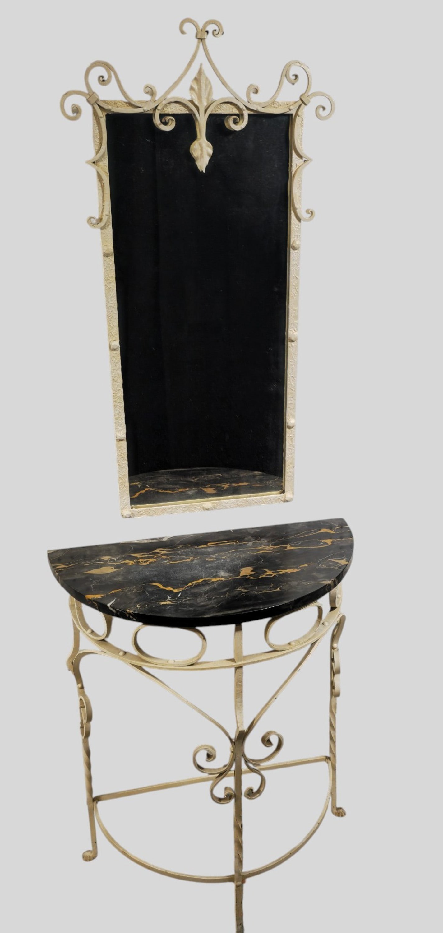Marble Top Iron Console and Mirror: Marble Top Iron Console and Mirror. USA. 1940's. Mirrored glass and, marble and iron. Console 24 3/4w x 13 1/8d x 31h. Mirror 18 1/2 x 2d x 35 3/4h.