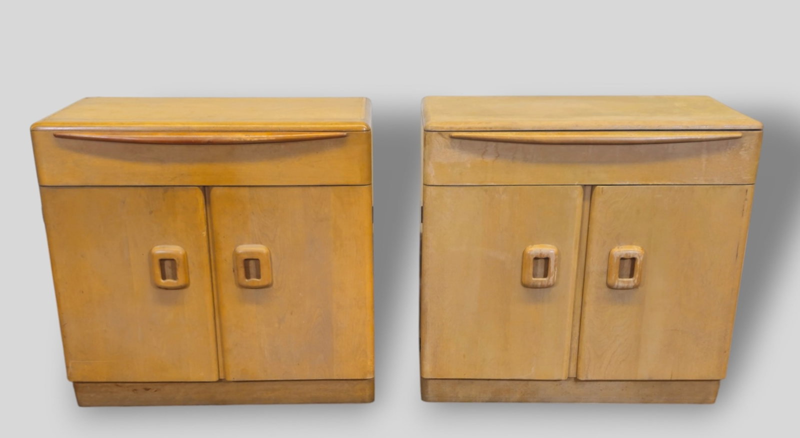 Heywood Wakfield Cabinets Model #M590: Heywood Wakfield Cabinets Model #M590. Pair. USA, 1950. One drawer and two doors. Wheat finish. 34w x 18d x 33h.