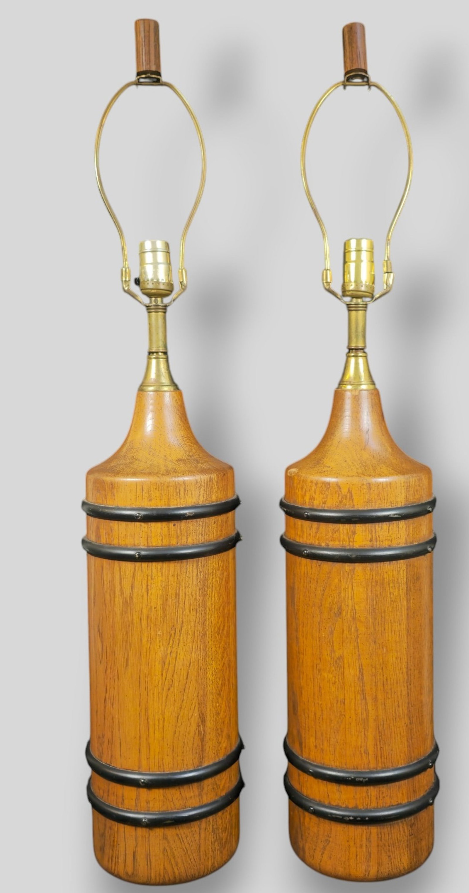 Swiss MCM Oak & Ebony Table Lamps: Swiss MCM Oak & Ebony Table Lamps. Pair. 1950s. 6 dia x 27h.