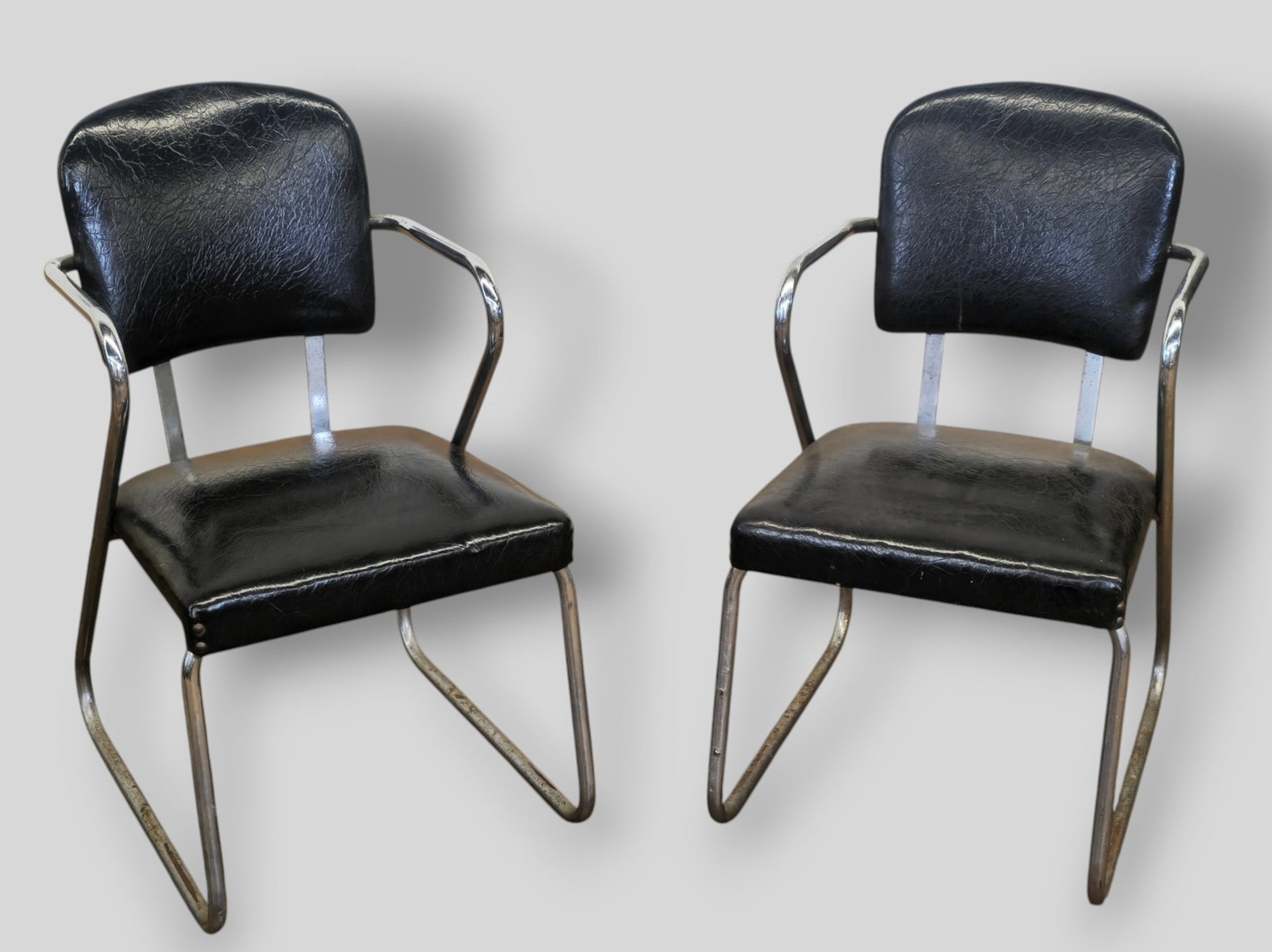 Wolfgang Hoffman Art Deco Chairs: Wolfgang Hoffman Art Deco Chairs. Pair. Howell Manufacturing Co. USA. 1934. Chrome plated steel and vinyl. 19w x 25d x 34h. Sh-18.