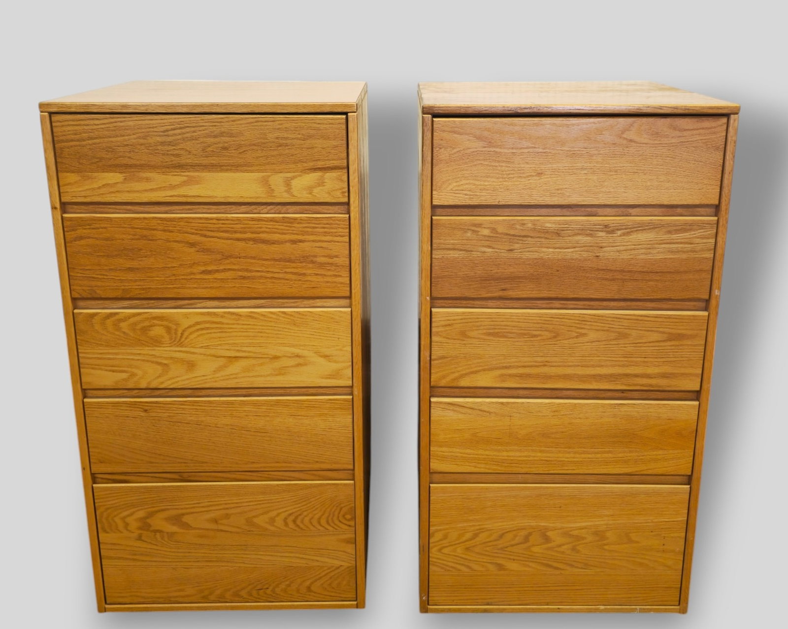MCM Oak Five Drawer Chests: MCM Oak Five Drawer Chests. Pair. USA. 1980. 24w x 24d x 45 1/2h.