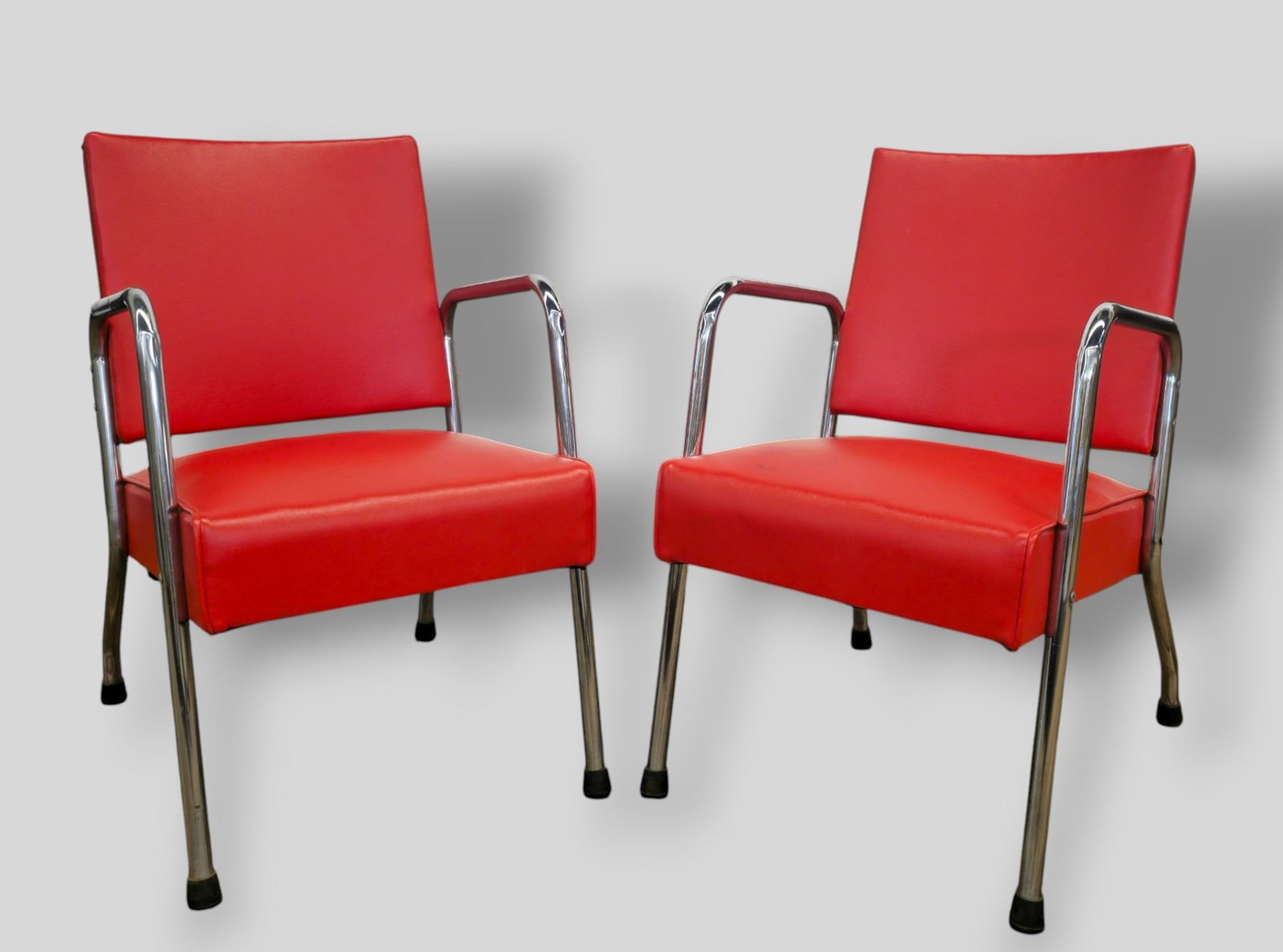 Art Deco Revival Lounge Chairs: Art Deco Revival Lounge Chairs. Pair. USA, 1970's. Chrome plated metal and vinyl. 20w x 26d x 32h. Sh- 18.
