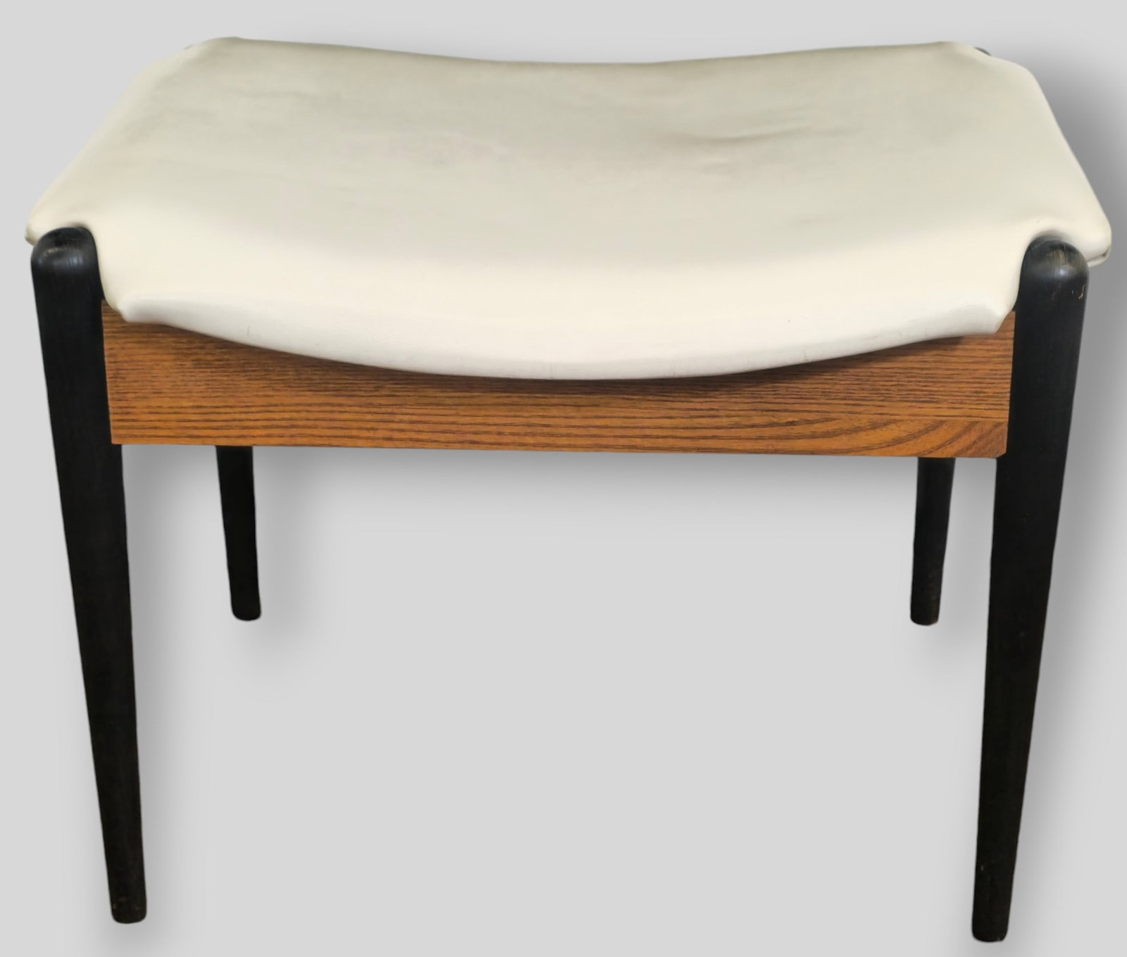 Arthur Umanoff Stool Model 3007: Arthur Umanoff Stool Model 3007. Washington Woodcraft. USA, 1965. Walnut, leather and ebonized wood. 20w x 15d x 17h.