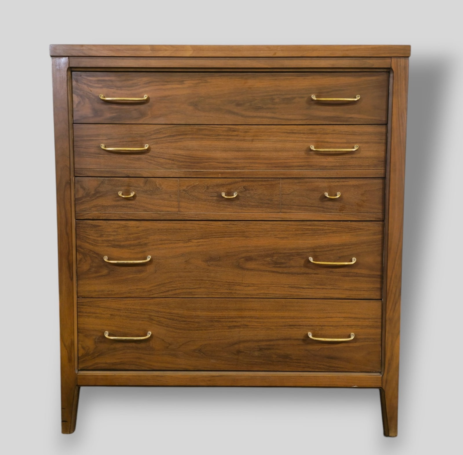 Broyhill MCM Forward Line Chest/ Dresser: Broyhill MCM Forward Line Chest/ Dresser . USA. 1960. Walnut and brass plated metal. Cabinet features 5 drawers. 38 1/4w x 19d x 42 3/8h
