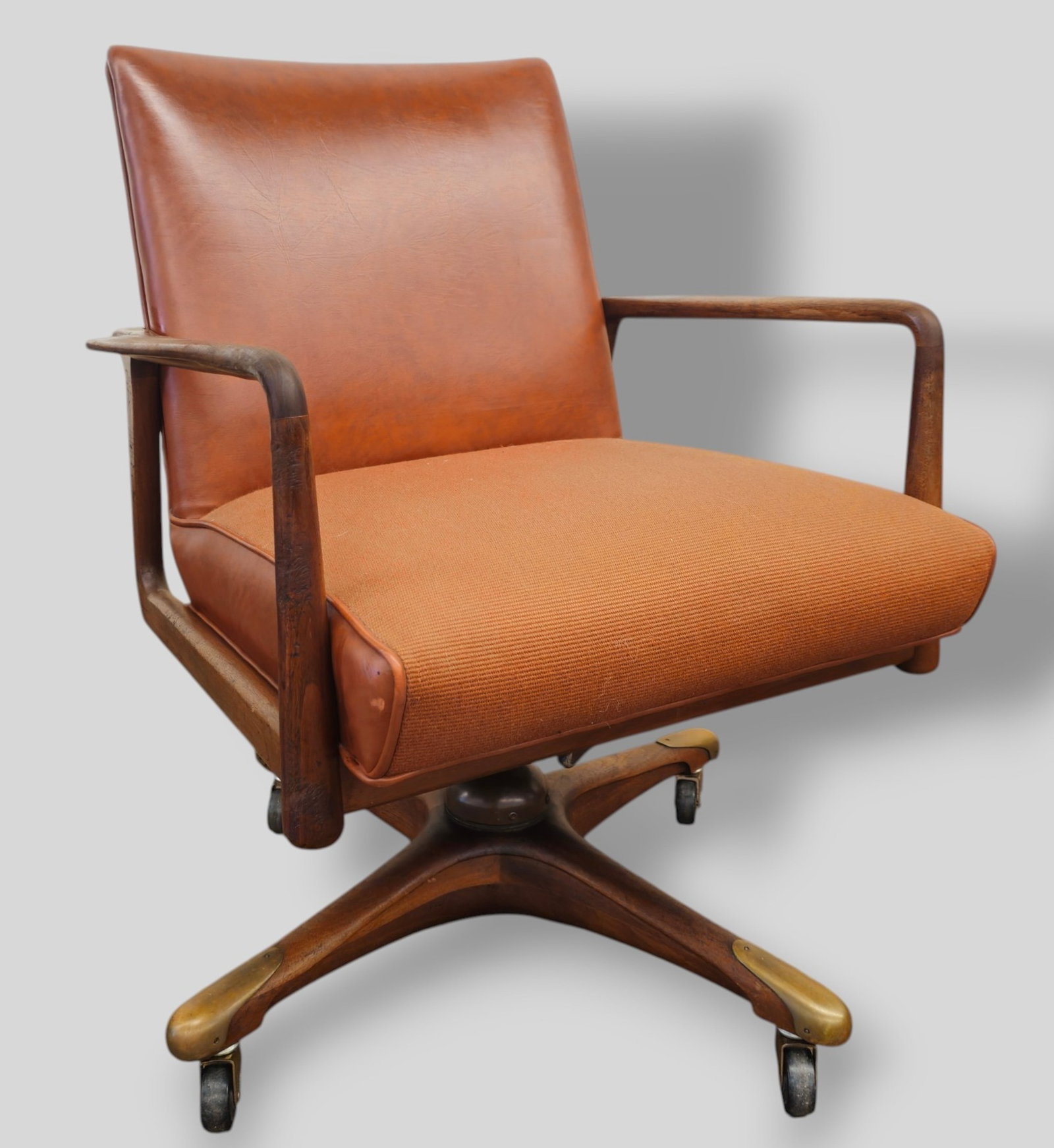 George Reinehl Stow & Davis Executive Armchair: George Reinehl Stow & Davis Executive Armchair. Stow & Davis. USA. 1959. Walnut, upholstery and Vinyl. 25 1/4 w x 24 1/2 d x 32 3/4h. Sh-18.