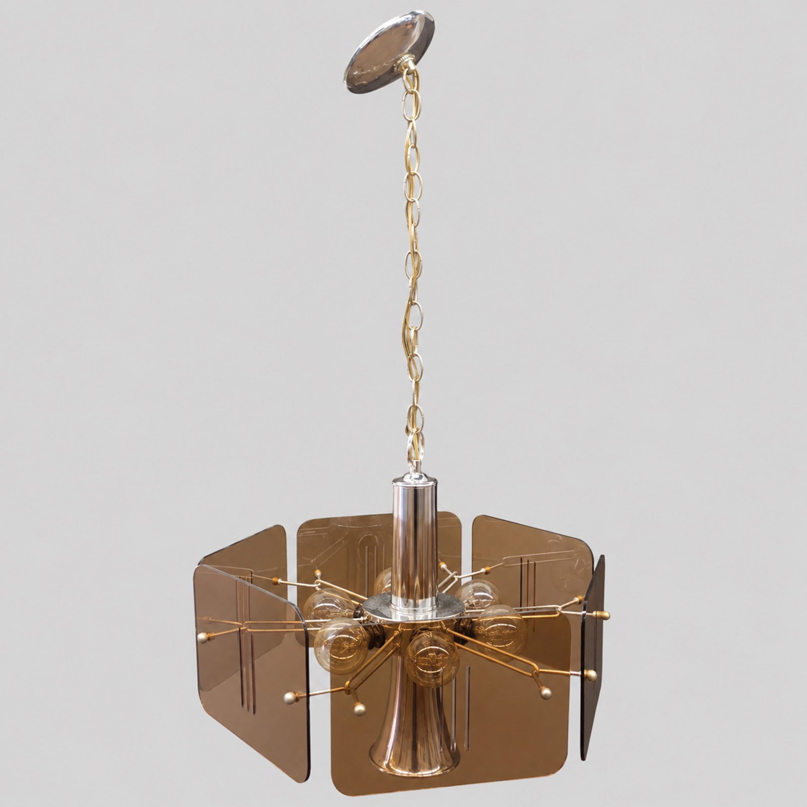 MCM Acrylic and Chome Pendant Chandelier: MCM Acrylic and Chome Pendant Chandelier. USA, 1970s. Chandelier 14w x 14d x 14h. Total height with chain 33 1/2.