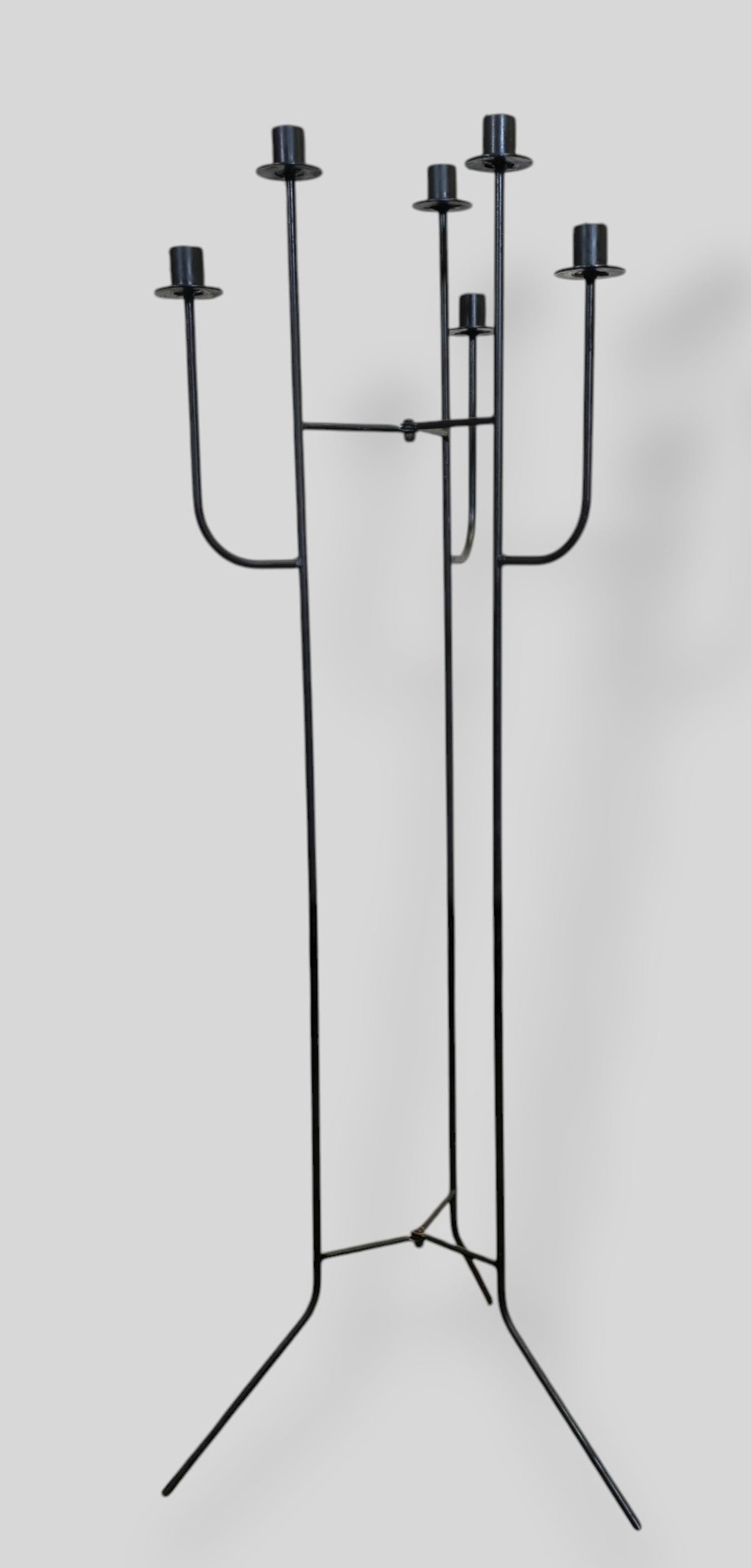 MCM Scandinavian Enameled Candlabrum: MCM Scandinavian Enameled Candlabrum. 1970s. Hinged tri-legged candelabrum. Enameled metal. 15w x 13d x 42h.