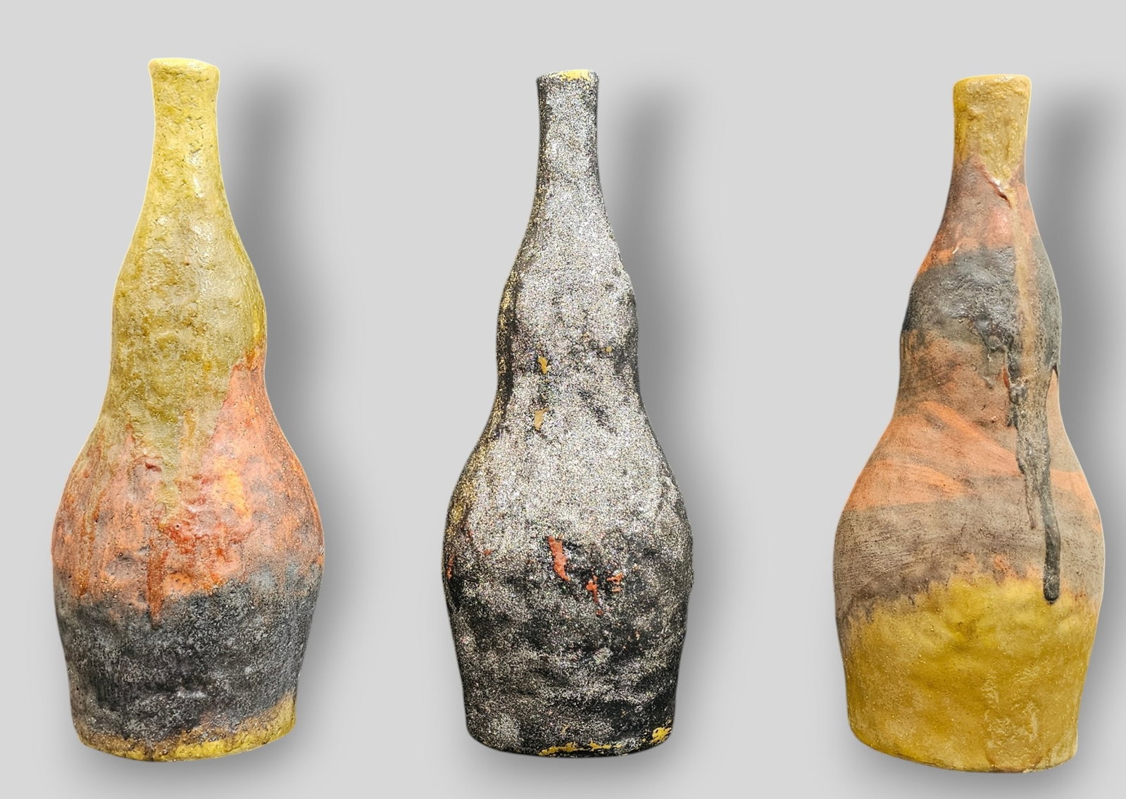 Marcello Fantoni Raymor Volcanic and Special Glazed Earthenware Vessels, Set of Three: Marcello Fantoni Raymor Glazed Earthenware Vessels, set of three. Two have volcanic glaze. One has experimental Glaze. Each are signed to underside. Provenance: The Jonas Meyer Karp, Cincinnati, Ohio.