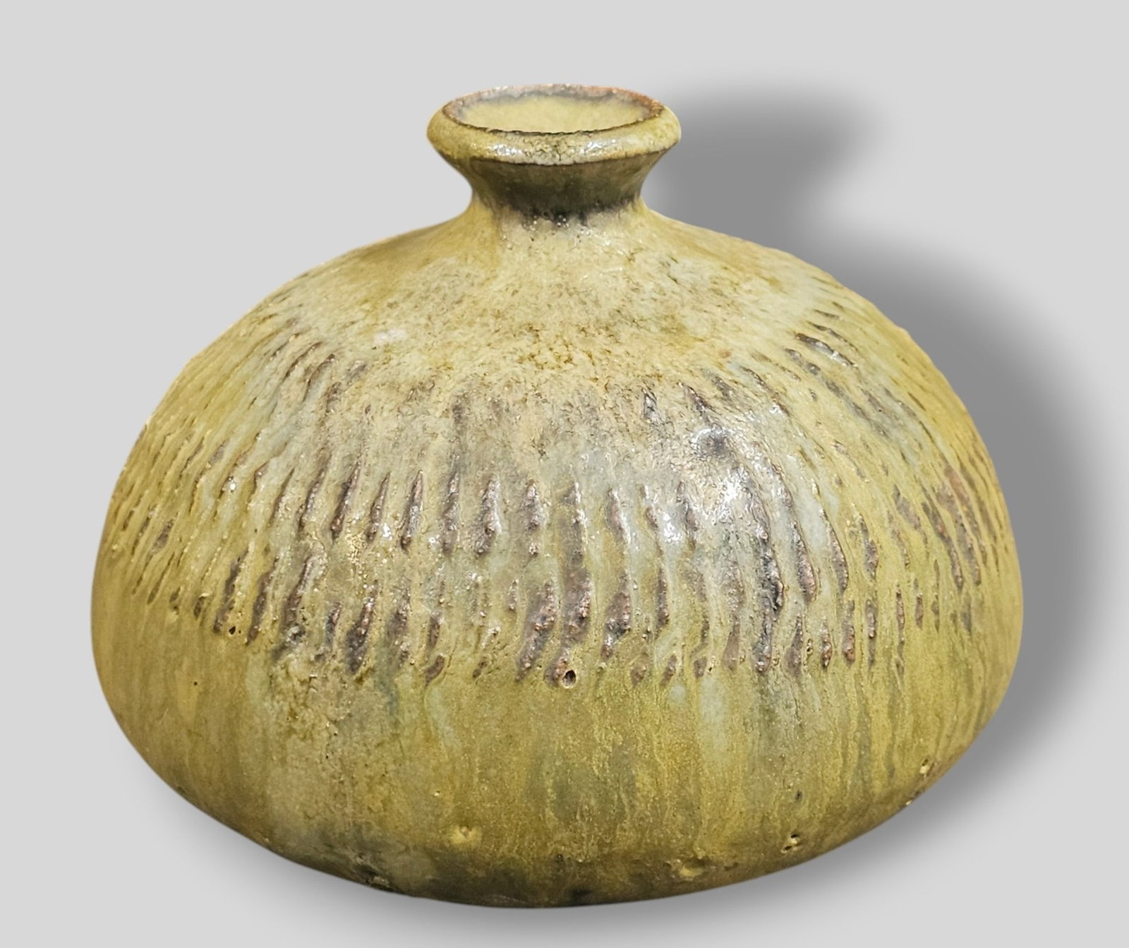 Gertrud and Otto Natzler Volcanic Glazed Earthenware Cabinet Vase: Gertrud and Otto Natzler Glazed Earthenware Bottle. 1973.Signed to underside. Provenance: The Jonas Meyer Karp, Cincinnati, Ohio. 4 dia x 3 1/2h.