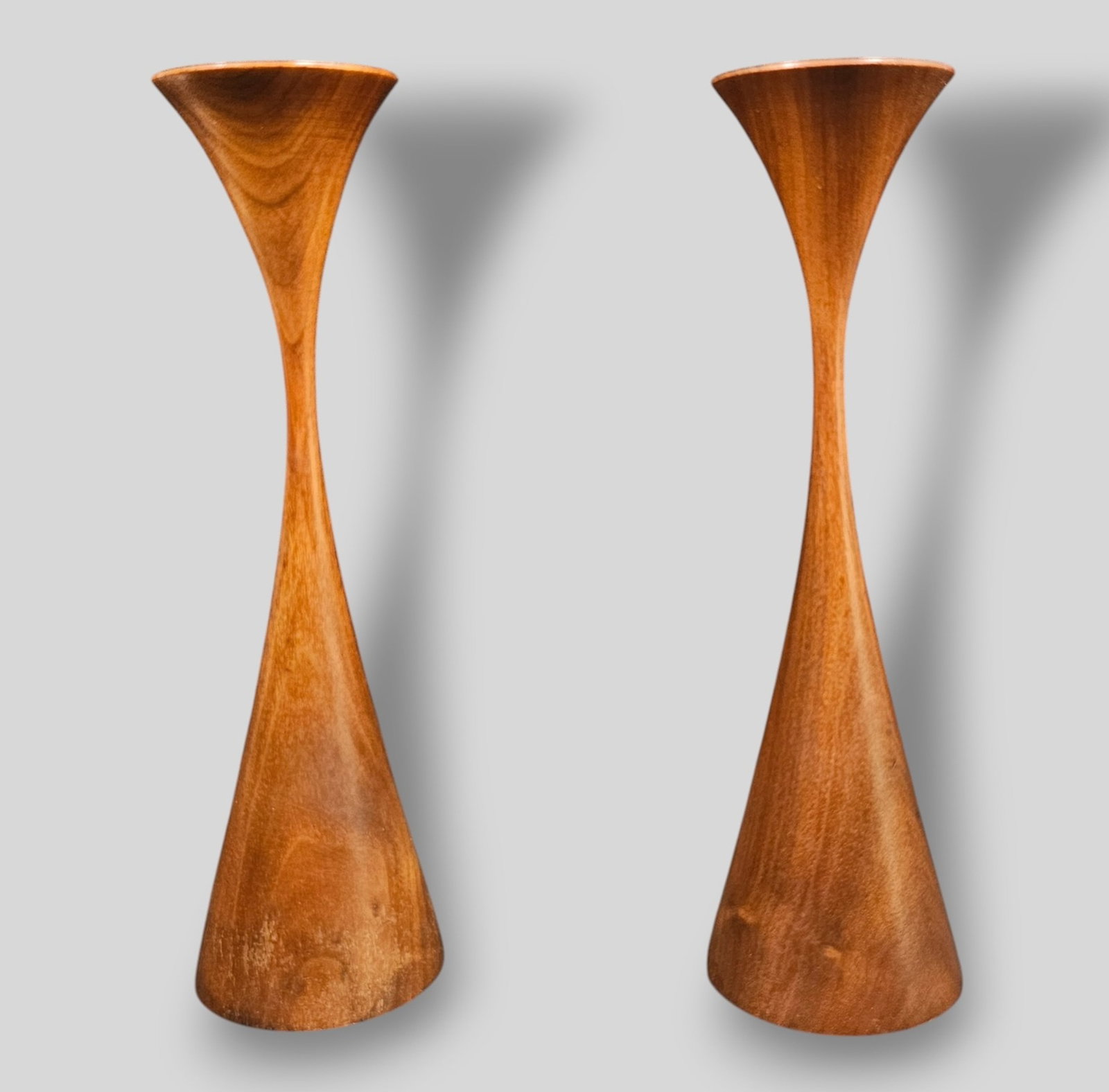 Rude Osolnik Candlesticks: Rude Osolnik Candlesticks. USA. 1990. Signed to underside of one. Walnut. 2 3/4 dia x 9 1/4h.