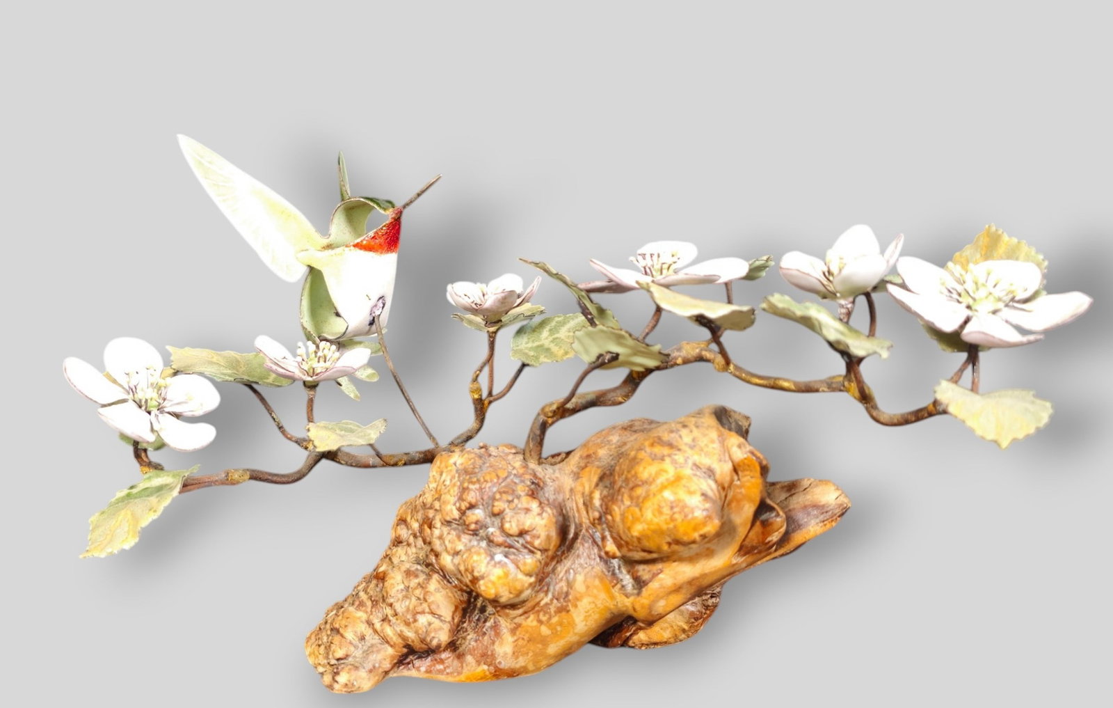 Norman Brumm Hummingbird Sculpture: Norman Brumm Hummingbird Sculpture. USA. 1960. Enamel on copper and organic wood. Stamped mark to underside Brumm. 11w x 7d x 5 3/4h.
