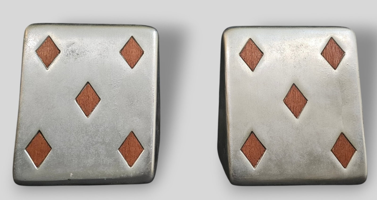 Ben Seibel Bookends: Ben Seibel Bookends. Jenfredware( A division of Maison Gournet Products) . USA. 1955. Manufacturer's label to underside of each. Metalic glazed cast metal and walnut inlay. 2 7/8w x 5d x 6h.
