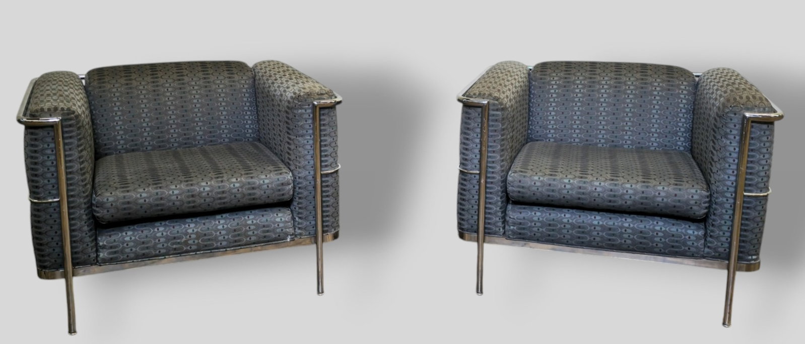 Jack Cartwright After Le Corbusier LC2 Lounge Chairs: Jack Cartwright After Le Corbusier LC2 Lounge Chairs. Pair. Jack Cartwright Inc. Chrome plated tubular metal and upholstery. 36w x 31d x 26 1/2h. Sh-17 1/2.