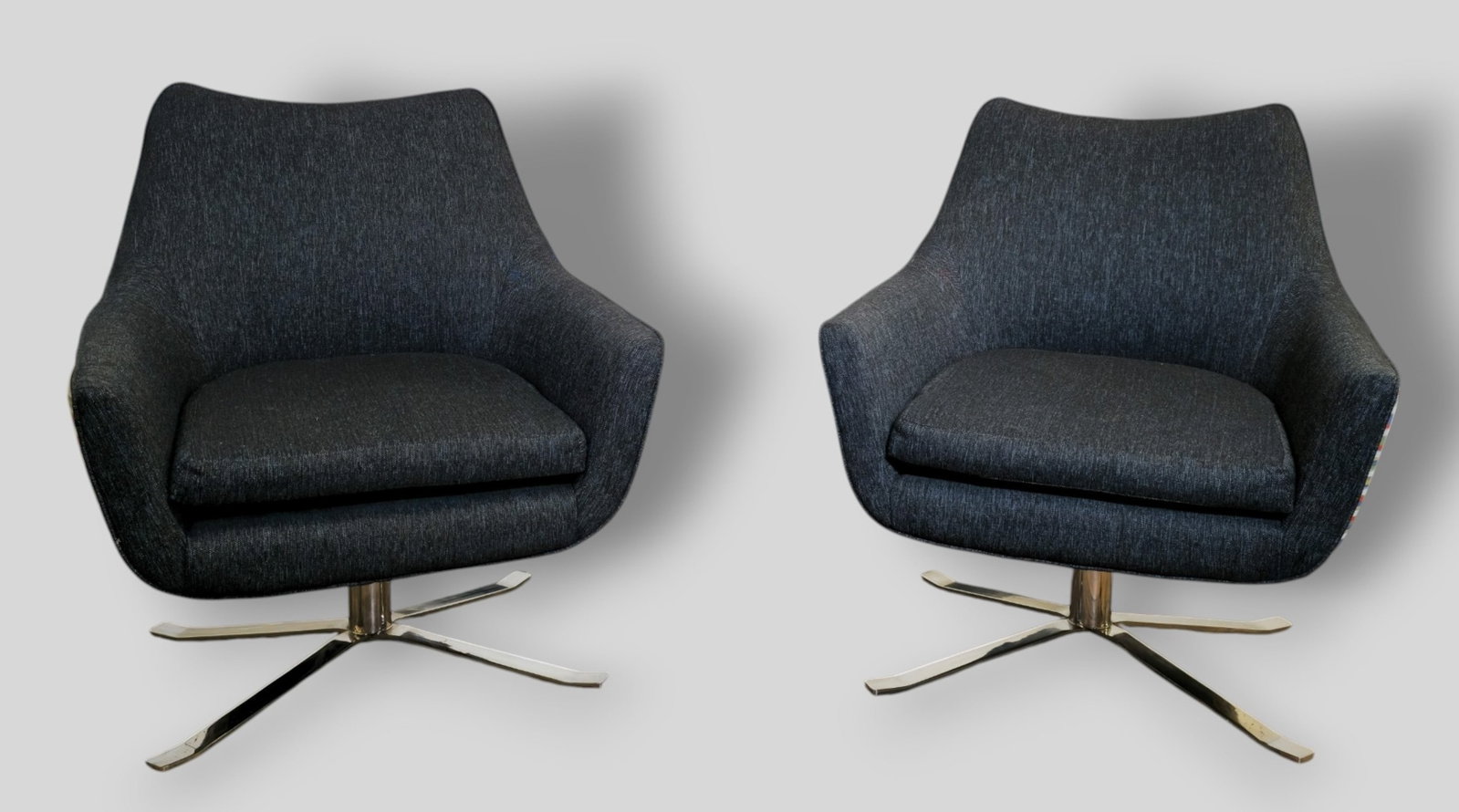 Nicos Zographos Style Lounge Chairs: Nicos Zographos Style Lounge Chairs. Pair. USA. 1980s. Upholstery and chrome plated steel. 29w x 29d x 34h. Sh-16 1/3