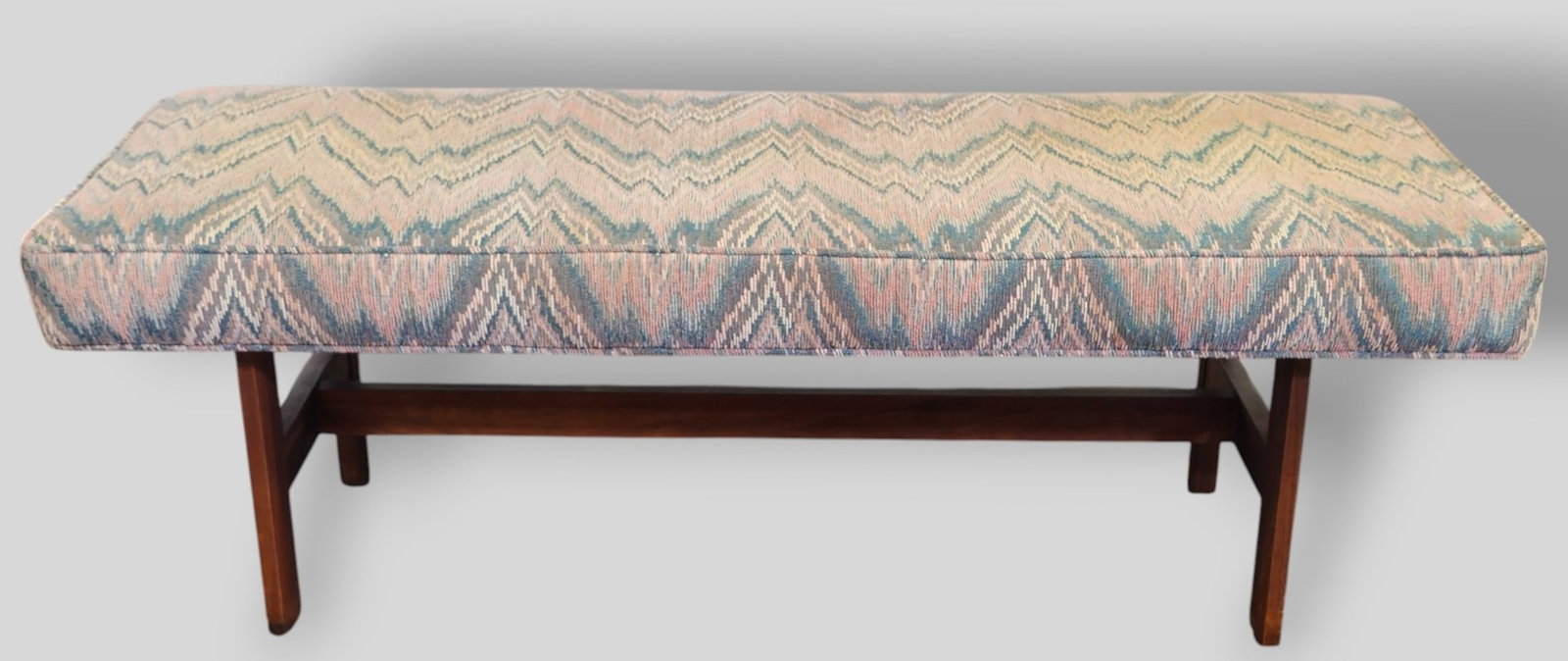 MCM Bench: MCM Bench. Style of Jens Risom and Jack Cartwright. USA. 1960. Walnut and upholstery. 58 3/4w x 19d x 16 1/4h.
