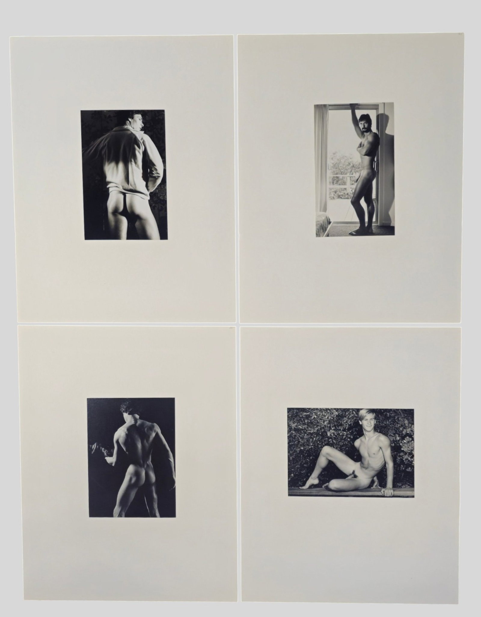 Anonymous 1980s Male Models: Anonymous 1980s Male Models. 4 total. 4 men in different poses. Mounted to paper. Image size 6 1/8 x 4 1/8.