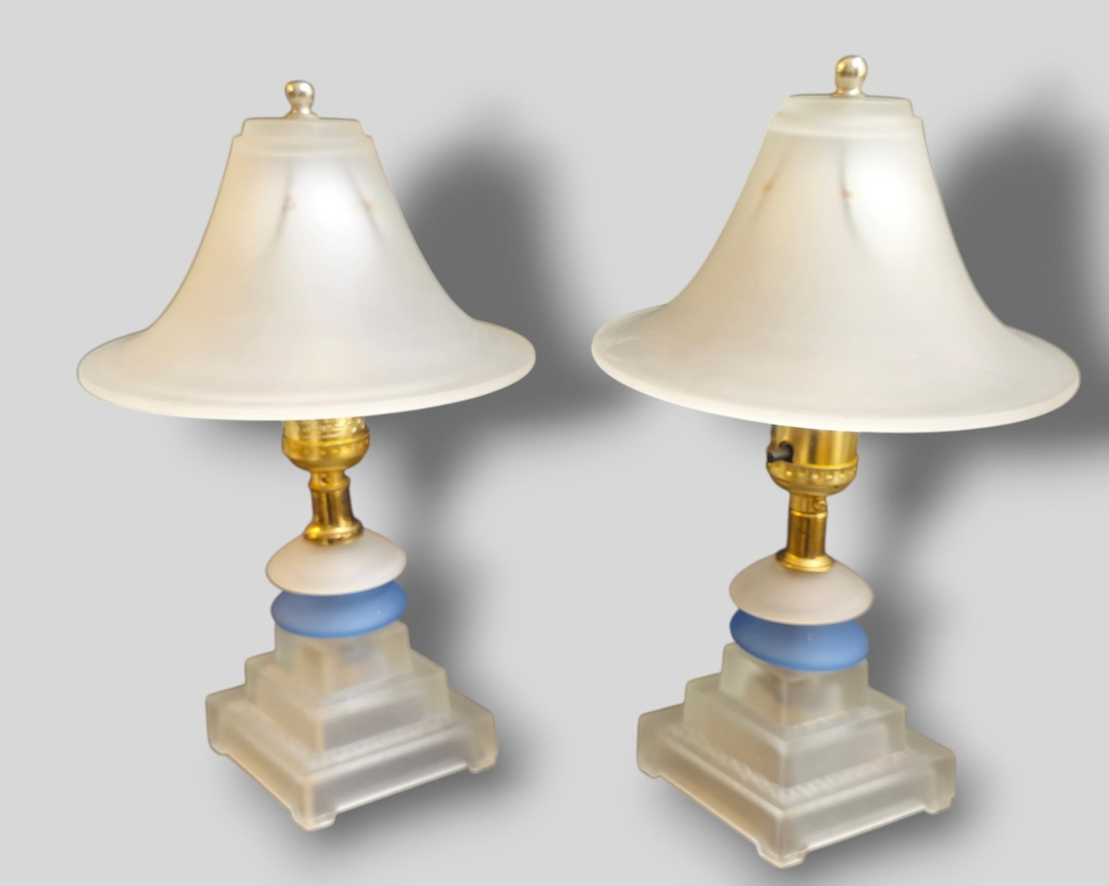 Houze Frosted Boudoir Vanity Lamps: Houze Frosted Boudoir Vanity Lamps. Pair. USA. 1930s. Frosted and blue glass. Overall 7 dia x 12h. Shades 7dia x 4 3/8h.