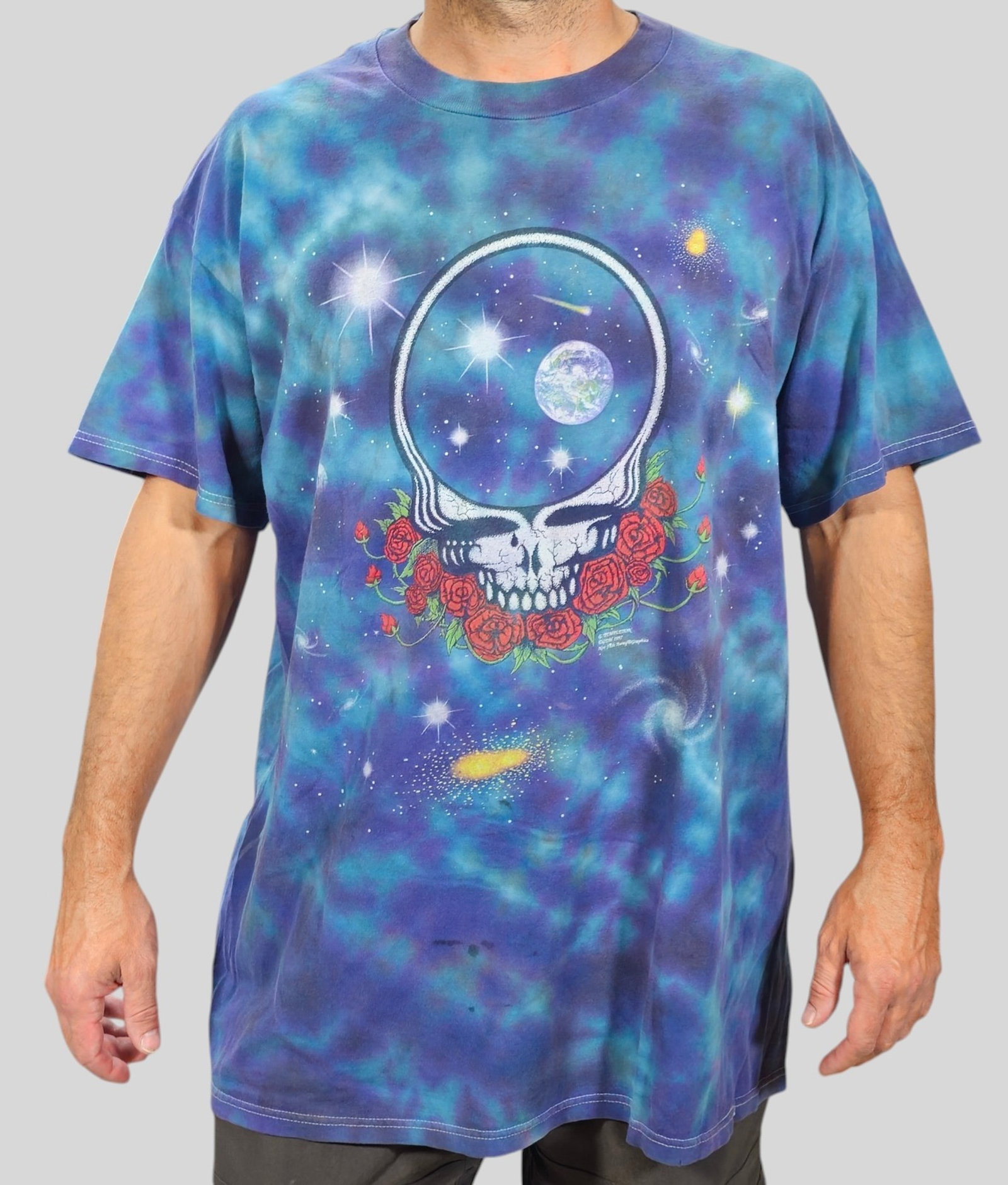 Vintage 1997 Grateful Dead Space Your Face Tie Dye T-Shirt Single Stitch: Vintage 1997 Grateful Dead Space Your Face Tie Dye T-Shirt Single Stitch. (NFA) Not Fade Away Graphics. Iconic "Steal Your Face" skull on front. Adapted celestrial theme graphic to back. 100% cotton