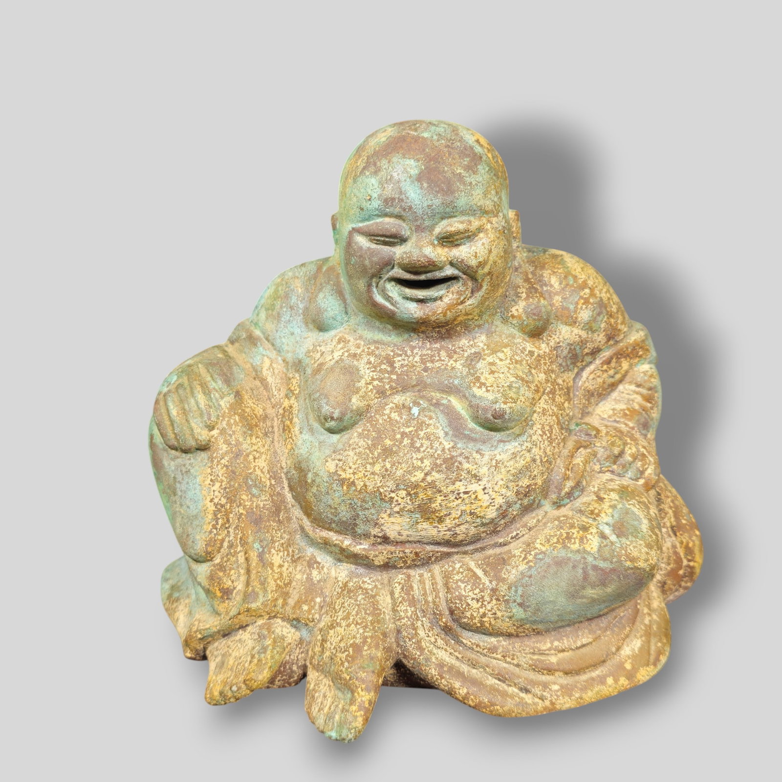 Chinese Bronze Hotei Buddha: Chinese Bronze Hotei (The laughing Buddha) Buddha. Holding Ceremonial Beads in left hand. 8 1/4w x 6d x 7 1/2h.