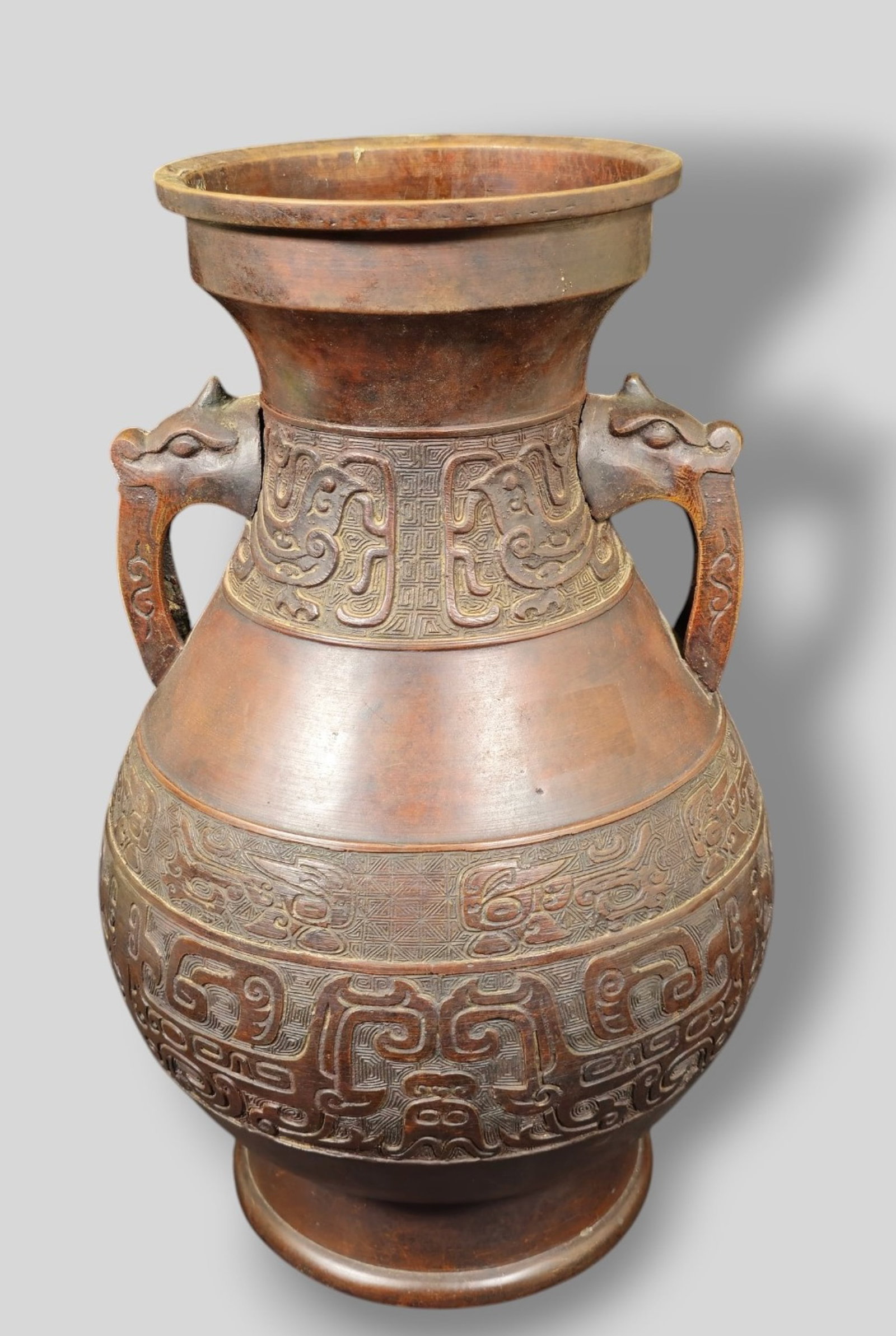 Chinese Archaistic Dark Patina Bronze Altar Vase: Chinese Archaistic Dark Patina Bronze Altar Vase. Double dragon loop handles. 9 12 dia x 14 1/8h.