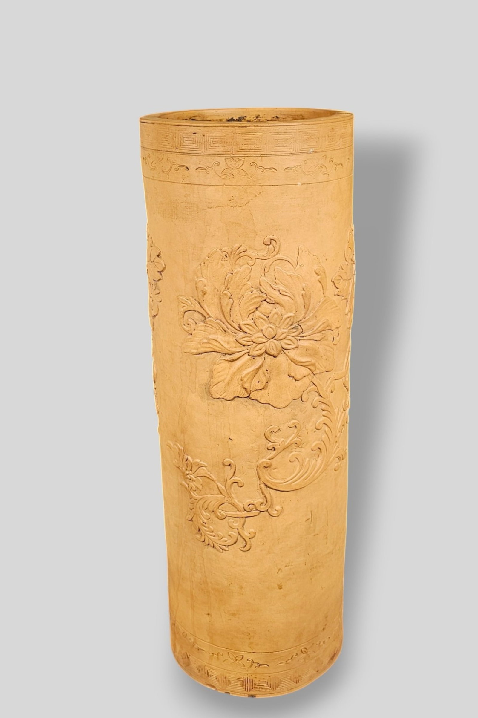 19th Century Chinese Yixing Zisha Red Clay Umbrella Stand: 19th Century Chinese Yixing Zisha Red Clay Umbrella Stand. High relief floral motif and Greek Key borders. 8 1/2 dia x 24 1/4h.