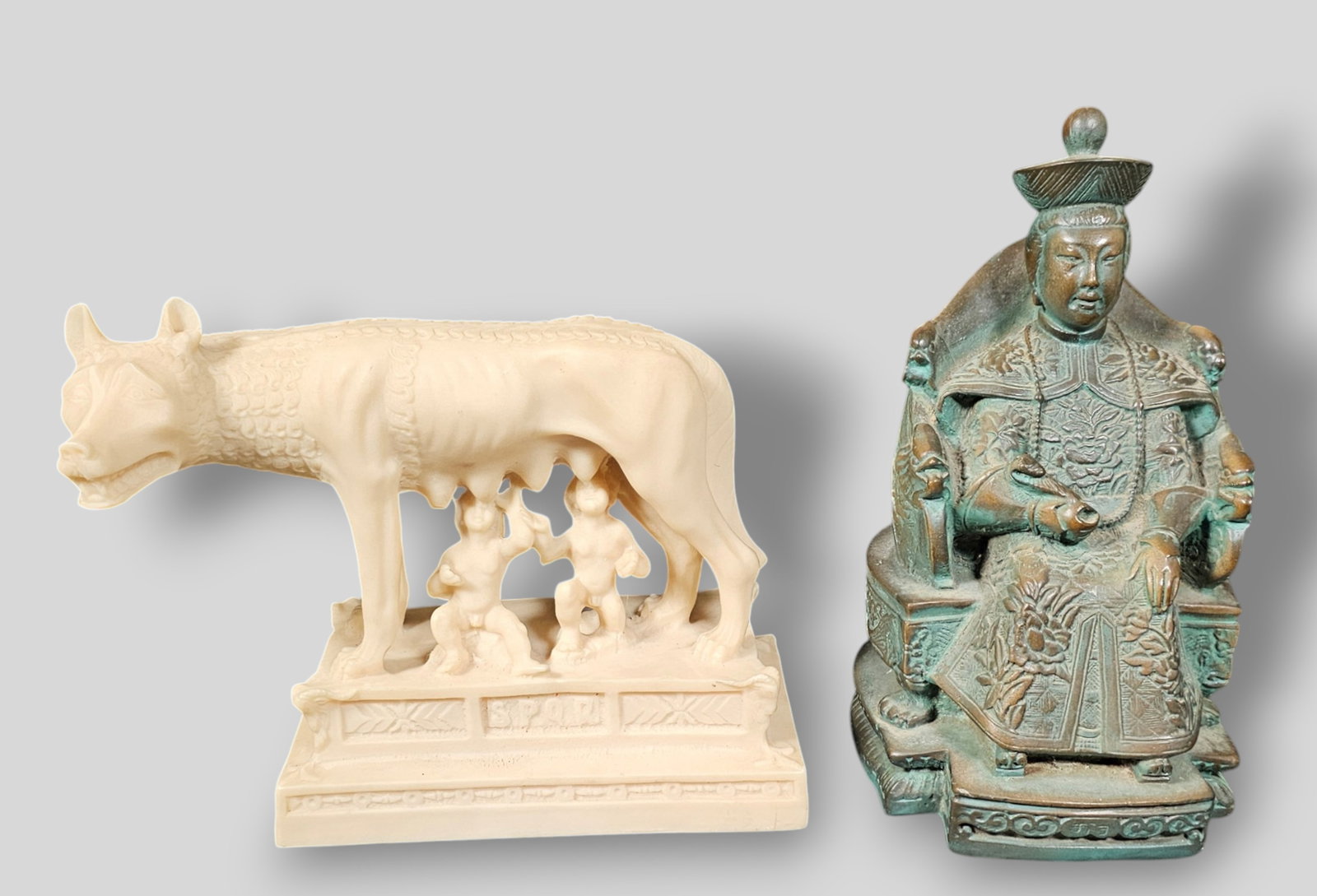 Chinese Seated Empress & Capitoline Wolf: Chinese Seated Empress & Capitoline Wolf. 20th Century. Cast Resin with applied finish and patina. Empress 5 1/2w x 5 3/4d x 9 3/4h. Wolf 10w x 4d x 8h.