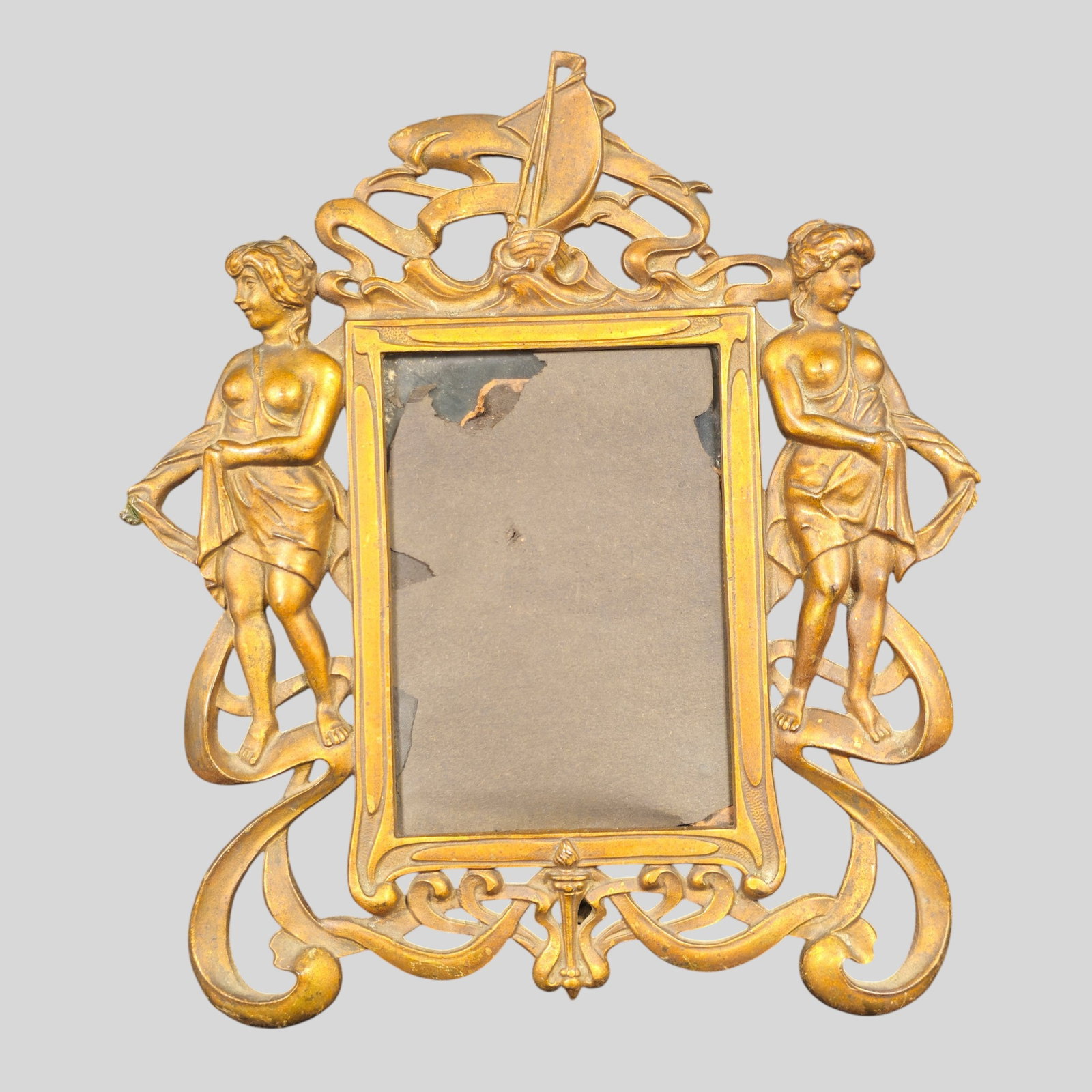 Cast Brass Art Nouveauu Beatrice Frame Model No. 1007A: Cast Brass Art Nouveauu Beatrice Frame Model No. 1007A. Circa 1920s. Original swing kick stand. 10w x 4 1/2d x 10 1/2h.
