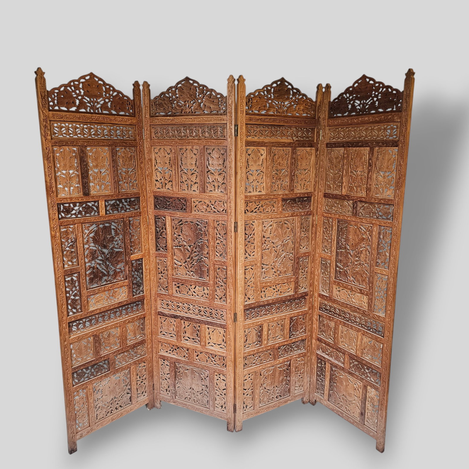 Four Panel Carved Teak Screen: Four Panel Carved Teak Screen. Open work paneled room divider with carved elephants, birds and floral motif. Open - 78w x 1 1/14d x 72 1/2h. Closed - 19 1/2w x 5d x 72 1/2h.