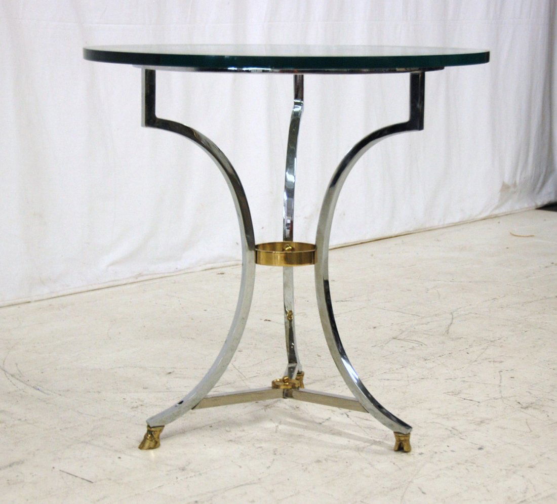 Maison Charles (Attribution): Chrome and brass plated elegant occasional table, donkey hoof feet, center finial. 27 Round, 26.5H.