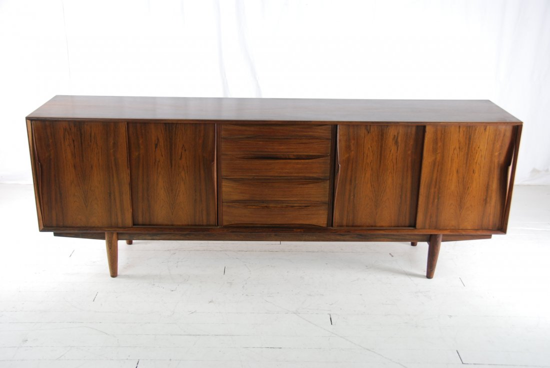 Arne Vodder: Rosewood credenza, Sculptured pulls, four sliding doors, center drawers. 86.75W x18.5D x 31.5H