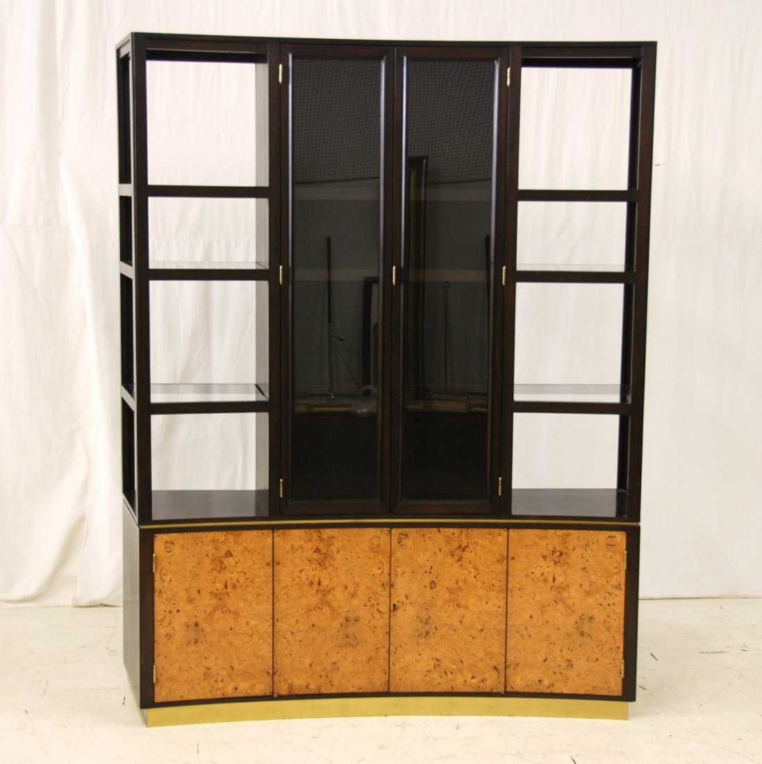 Edward Wormley: Two piece Mahogany and Olivewood display cabinet. Brass pulls and trim, MFG. by Dunbar, big D label in interior. 66W x 19D x 80H