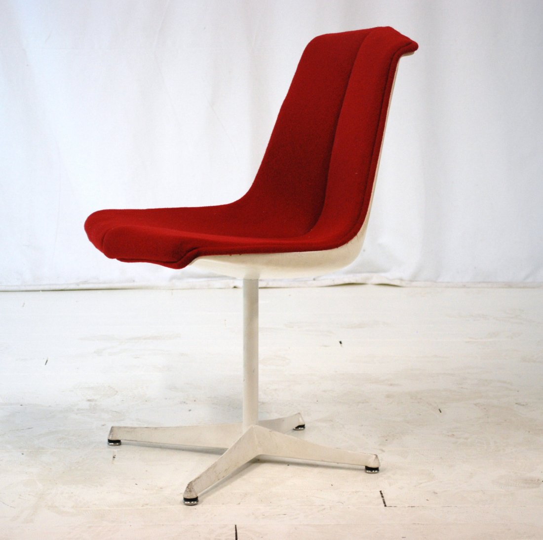 Florence Knoll: Early and rare four prong compass chair. Original red tweed upholstery. Early diamond label on underside. 20.5W x 18D x 32H