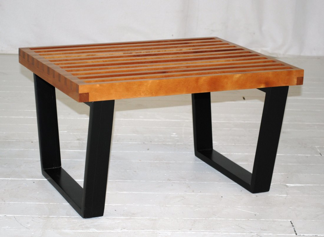 George Nelson: Primavera slat bench, ebonized legs, Herman Miller. 24.25W x 18.5D x 13.75H.