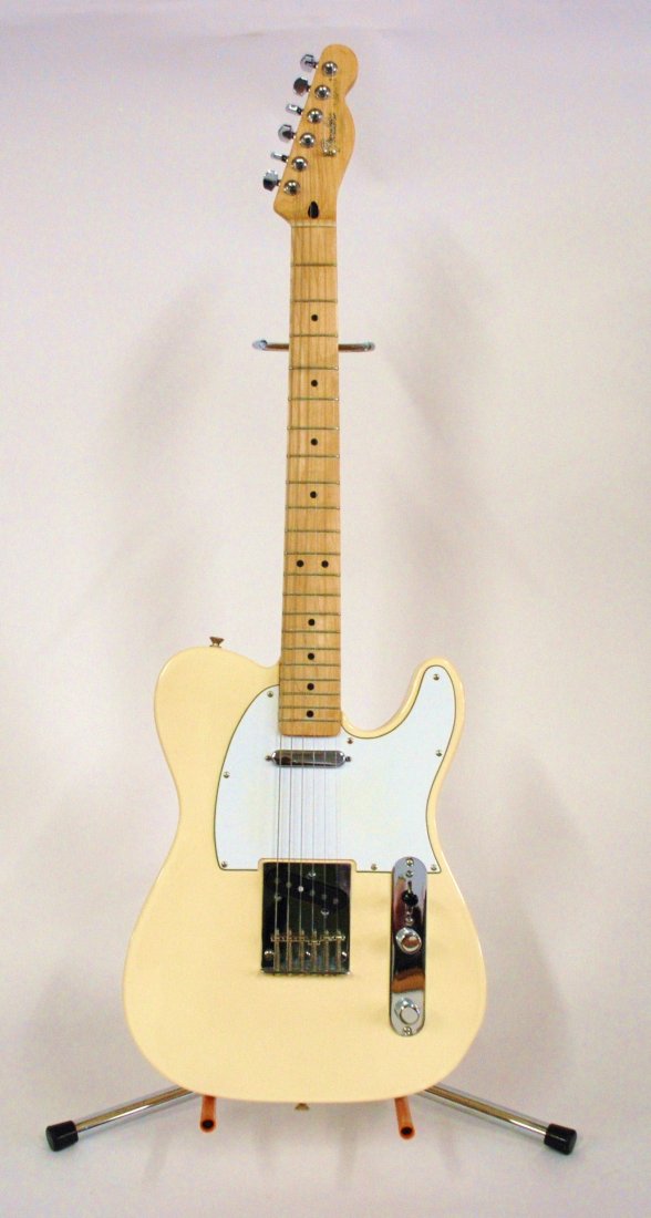 Fender Telecaster: Electric guitar in excellent condition. Comes with gig bag. 39.5"