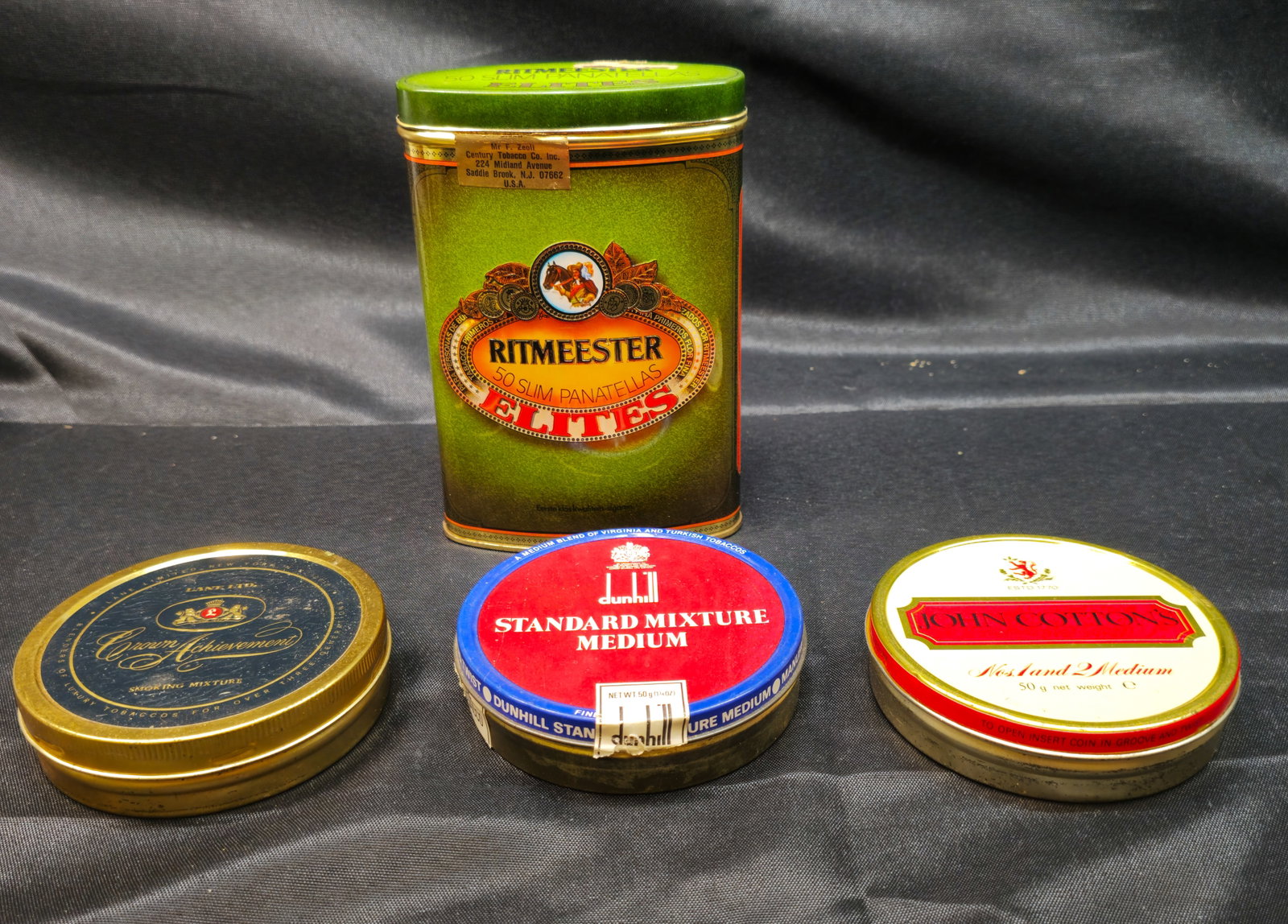 Vintage Tobacco Advertising Tins, Dunhill Plus: Vintage Tobacco Advertising Tins, Dunhill Plus. Group of four advertising tins including Dunhill Standard Mixture Medium 50g, John Cotton's Nos. 1 and 2 Medium 50g Traditional English Mixture, Lane Lt