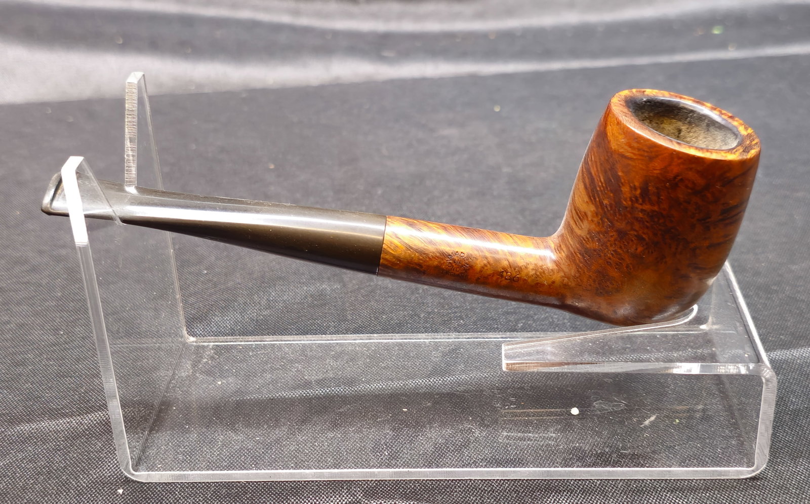 Comoy's Tradition 186: Comoy's Tradition 186. Smooth-finished briar tobacco pipe in a straight billiard shape with black vulcanite stem bearing the Comoy's three-piece "C" logo. Shank marked "Comoy's Tradition," "Made in