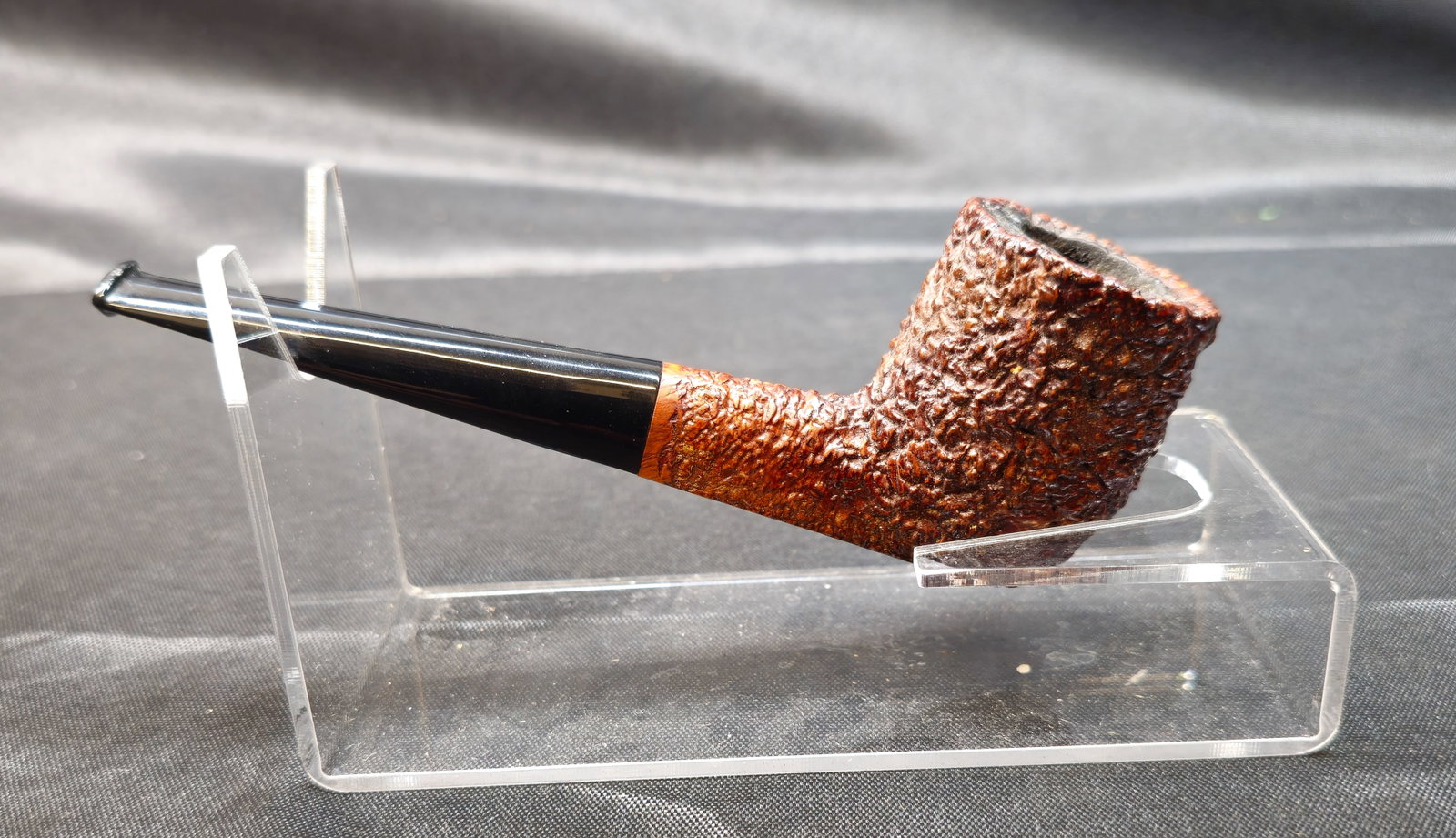 Castello Old Sea Rock KKK 67: Castello Old Sea Rock KKK 67. Italian briar tobacco pipe with heavily rusticated finish, black stem and bent Dublin form. Marked "Castello Old Sea Rock KKK 67" and "Made in Cantù Italy," with