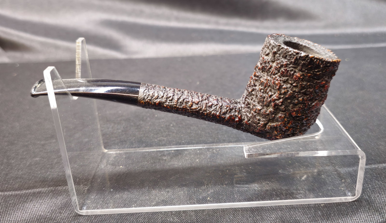 Castello Sea Rock Briar KKK 31: Castello Sea Rock Briar KKK 31. Italian briar tobacco pipe with deeply rusticated finish, straight form and black mouthpiece. Stamped "Castello Sea Rock Briar," "KKK 31," "Made in Cantu Italy" and