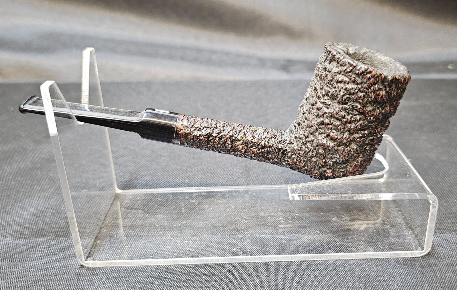 Castello Sea Rock Briar KKKK: Castello Sea Rock Briar KKKK. Italian briar tobacco pipe with deeply rusticated Sea Rock finish, tall straight bowl and black mouthpiece with white bar logo. Stamped "CASTELLO SEA ROCK BRIAR," "A," "K