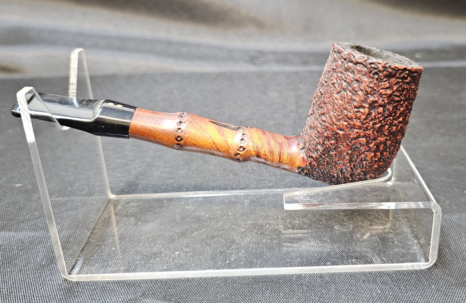 Radice Rind G: Radice Rind G. Italian briar tobacco pipe with partially rusticated bowl, smooth shank with decorative carved dot detailing and black mouthpiece with twin dot logo. Stamped "G," "RADICE RIND," and
