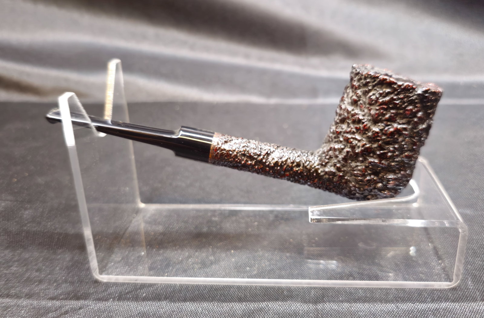 Castello Sea Rock Briar KKKK 16 Pipe: Castello Sea Rock Briar KKKK 16 Pipe. Italian briar tobacco pipe with deeply rusticated dark finish, tall straight bowl and black mouthpiece with white Castello accent. Stamped "KKKK 16," "Carlo