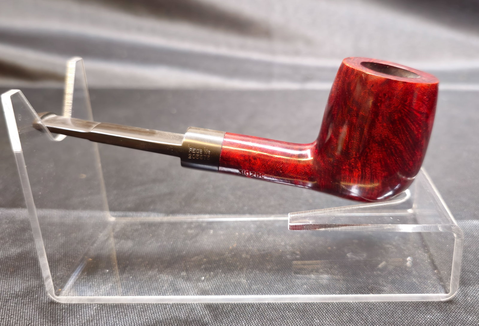 Charatan's Make Belvedere 3102DC Pipe: Charatan's Make Belvedere 3102DC Pipe. English briar tobacco pipe in a straight billiard shape with deep reddish-brown smooth finish and black vulcanite saddle stem bearing the white CP logo. Shank