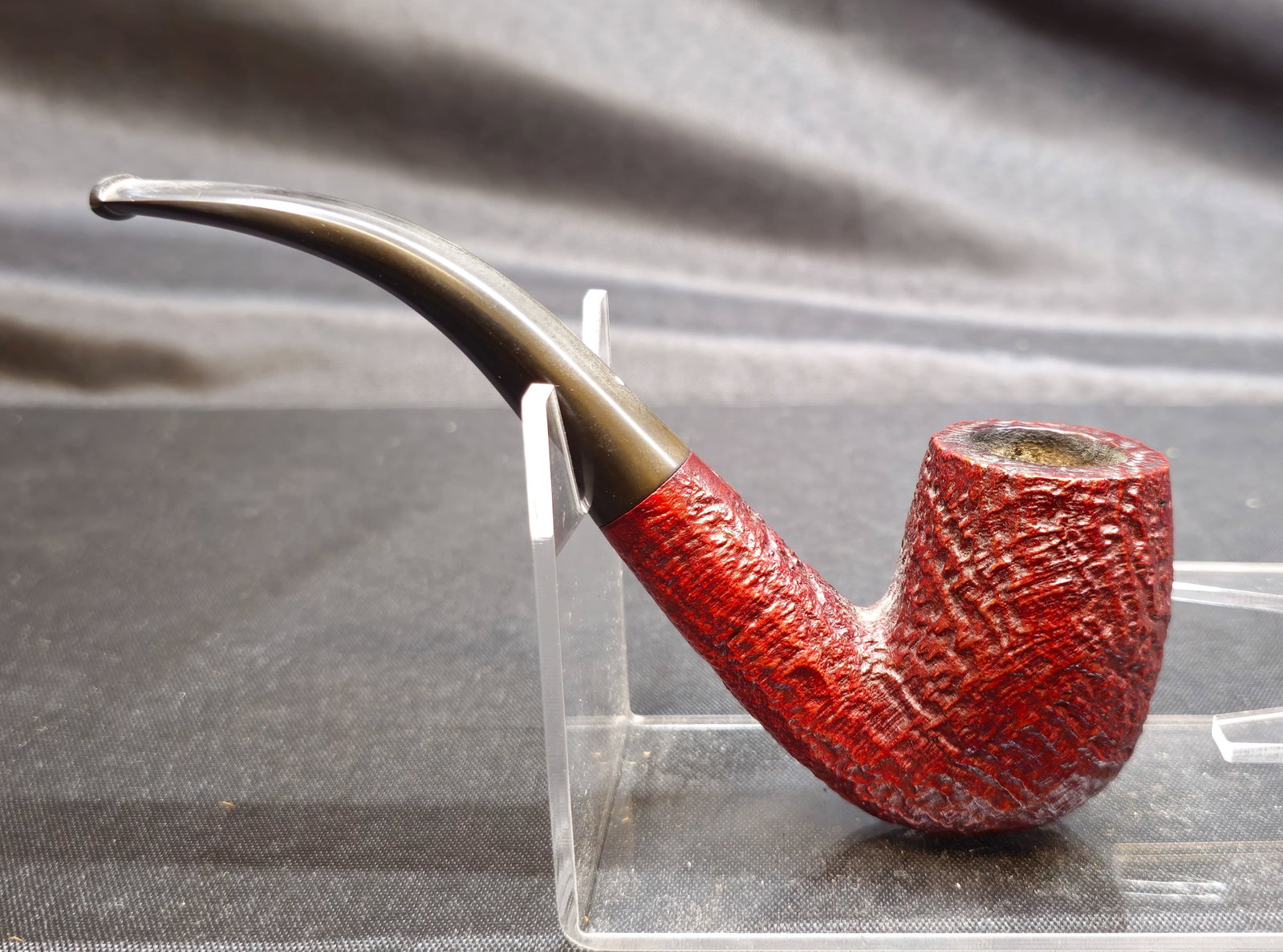 Dunhill Redbark 51021 Pipe: Dunhill Redbark 51021 Pipe. English briar tobacco pipe in a bent billiard shape with sandblasted Redbark finish in a rich red stain and curved black vulcanite stem. Marked "51021," "Dunhill Redbark"