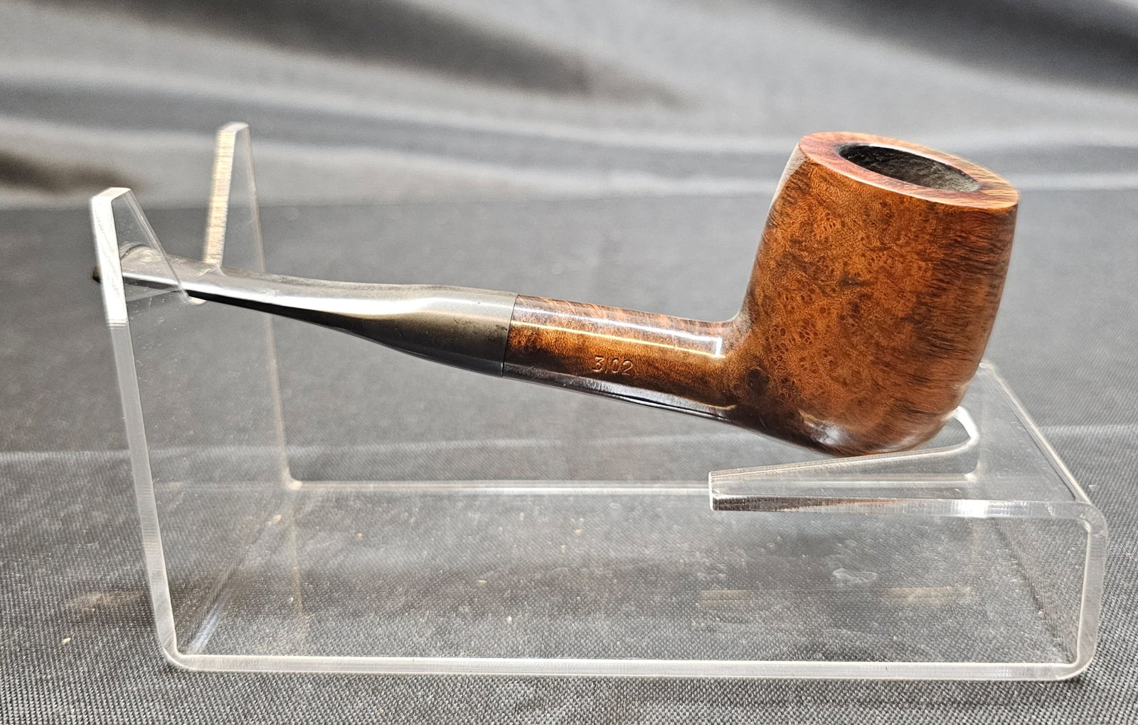 Charatan's Make Authentic 3102 Pipe: Charatan's Make Authentic 3102 Pipe. English briar tobacco pipe with smooth natural brown finish, straight form and black mouthpiece bearing the Charatan CP logo. Stamped "CHARATAN'S MAKE LONDON