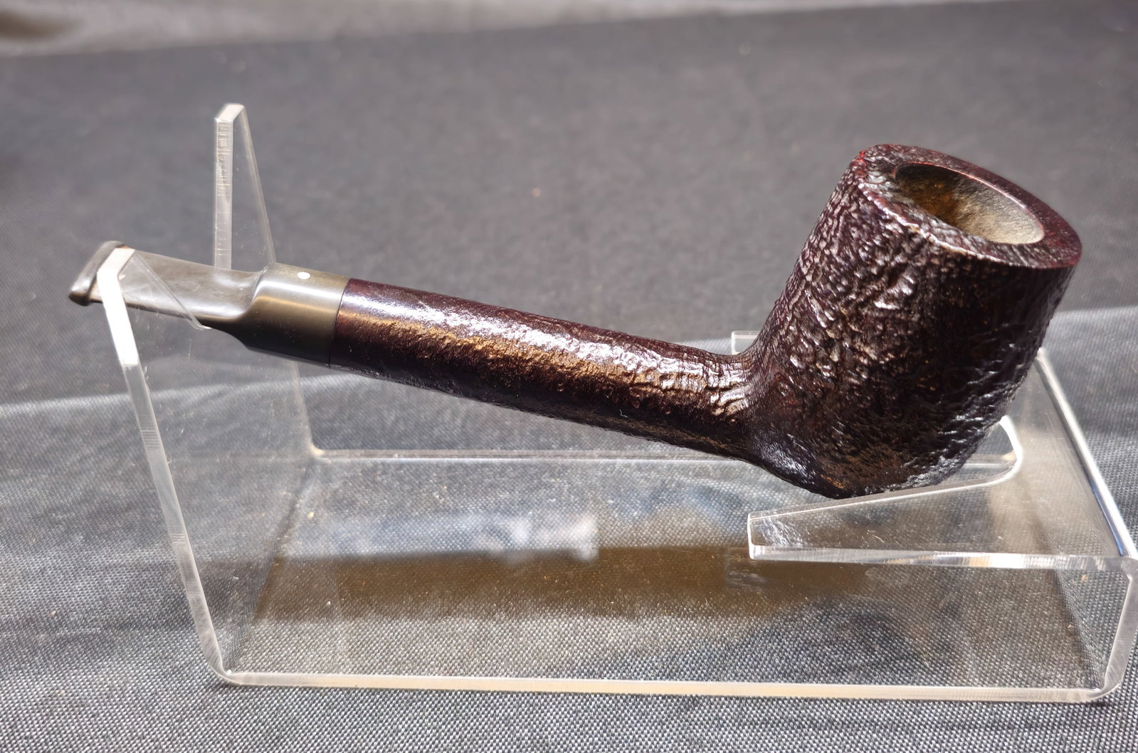 Dunhill Shell 6111 Pipe: Dunhill Shell 6111 Pipe. Circa 1968 English briar tobacco pipe with dark sandblasted Shell finish, straight form, black vulcanite mouthpiece, and Dunhill White Spot. Stamped "6111," "DUNHILL SHELL,"