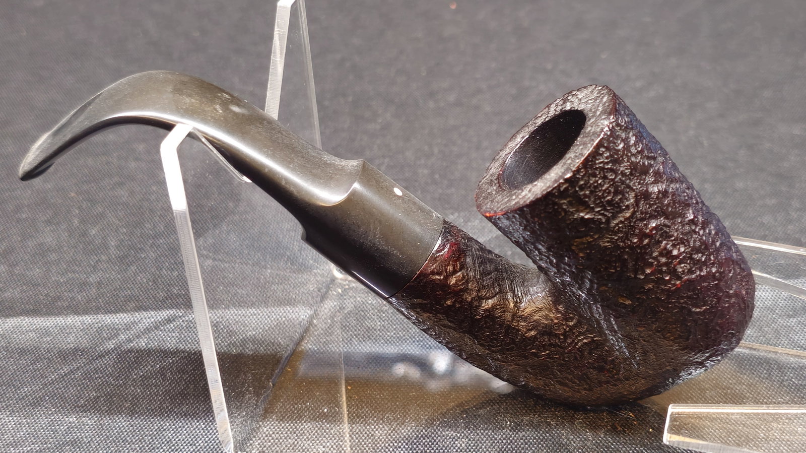 Dunhill Shell Briar 169 Pipe: Dunhill Shell Briar 169 Pipe. English briar tobacco pipe with dark sandblasted finish, bent shape and black curved mouthpiece with Dunhill white spot. Stamped "DUNHILL," "169 SHELL BRIAR," and "MADE